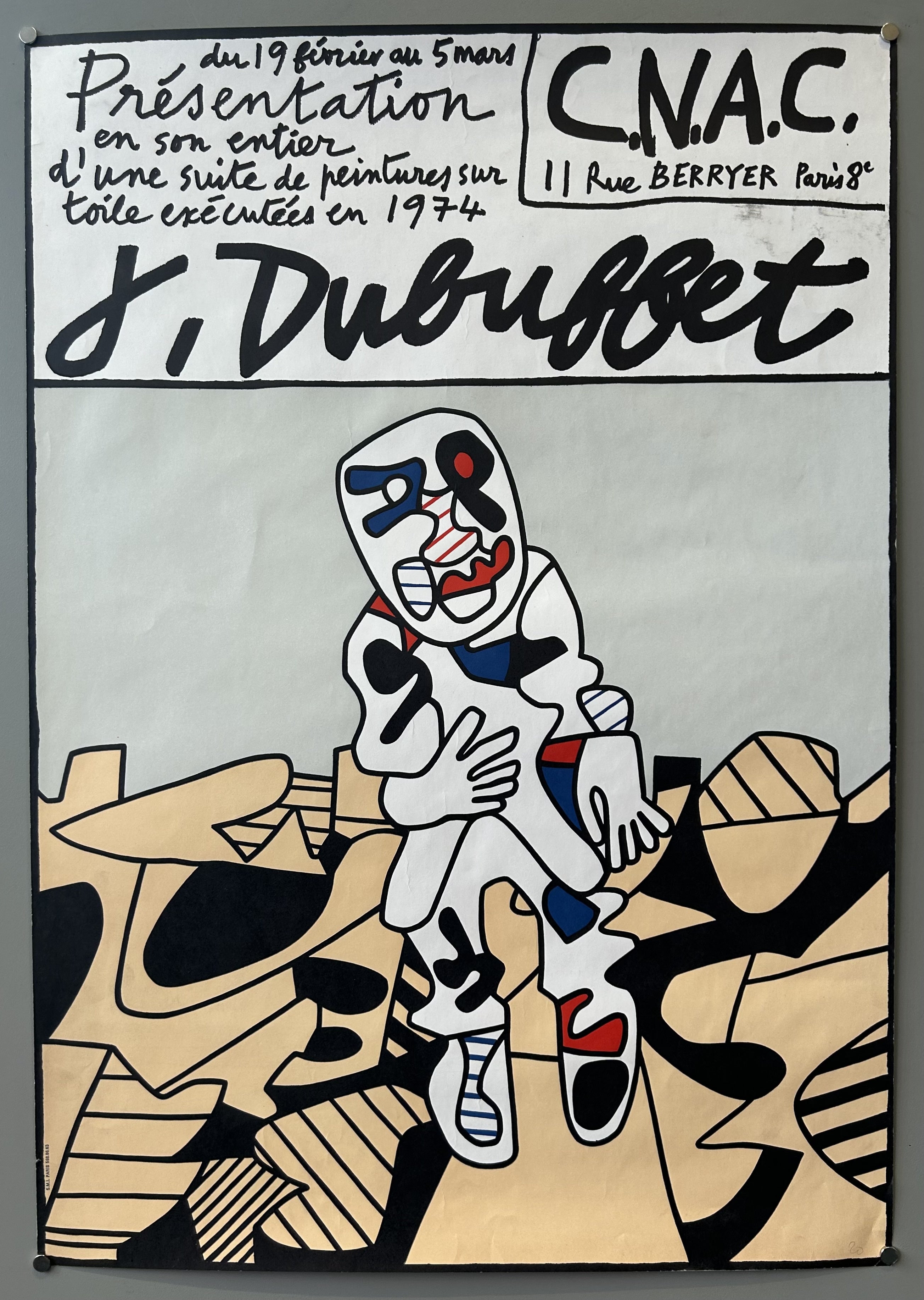 Poster for Jean Dubuffet's 1974 exhibition at C.N.A.C. in Paris, featuring a colorful abstract figure and French text with exhibition details.