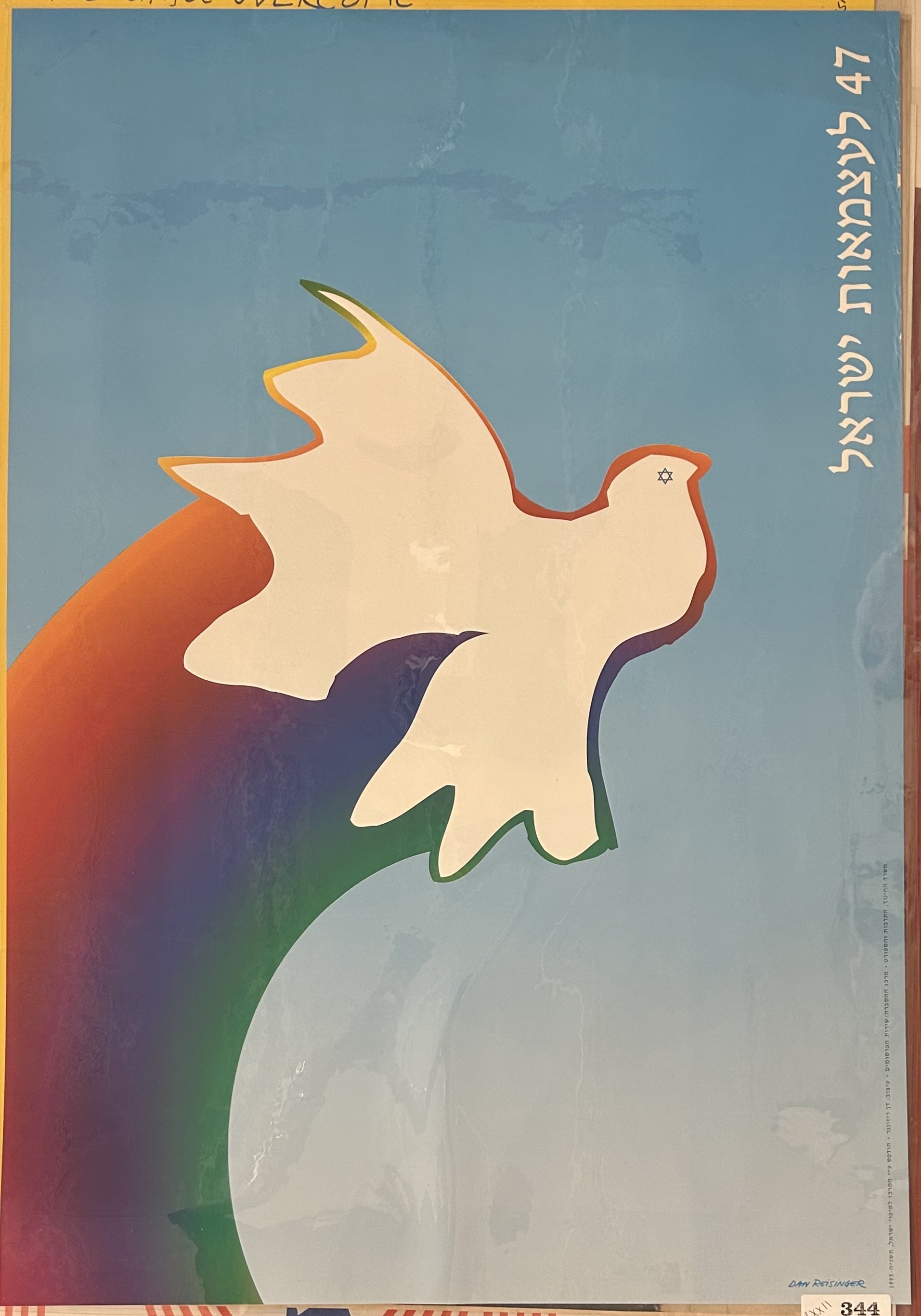 dove with rainbow against blue