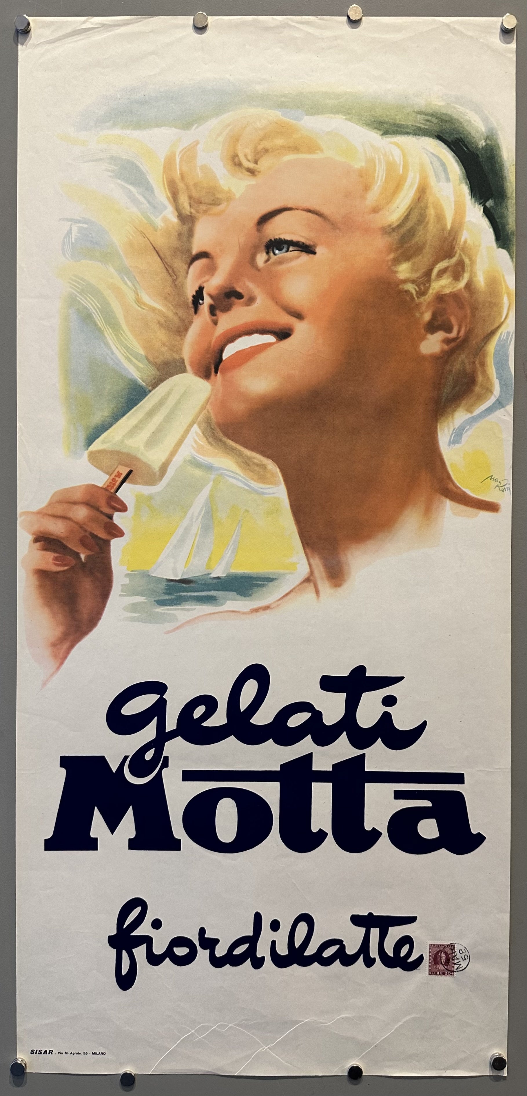 Smiling woman holds popsicle up to her mouth with black cursive text below her against white background for Gelati Motta ad.