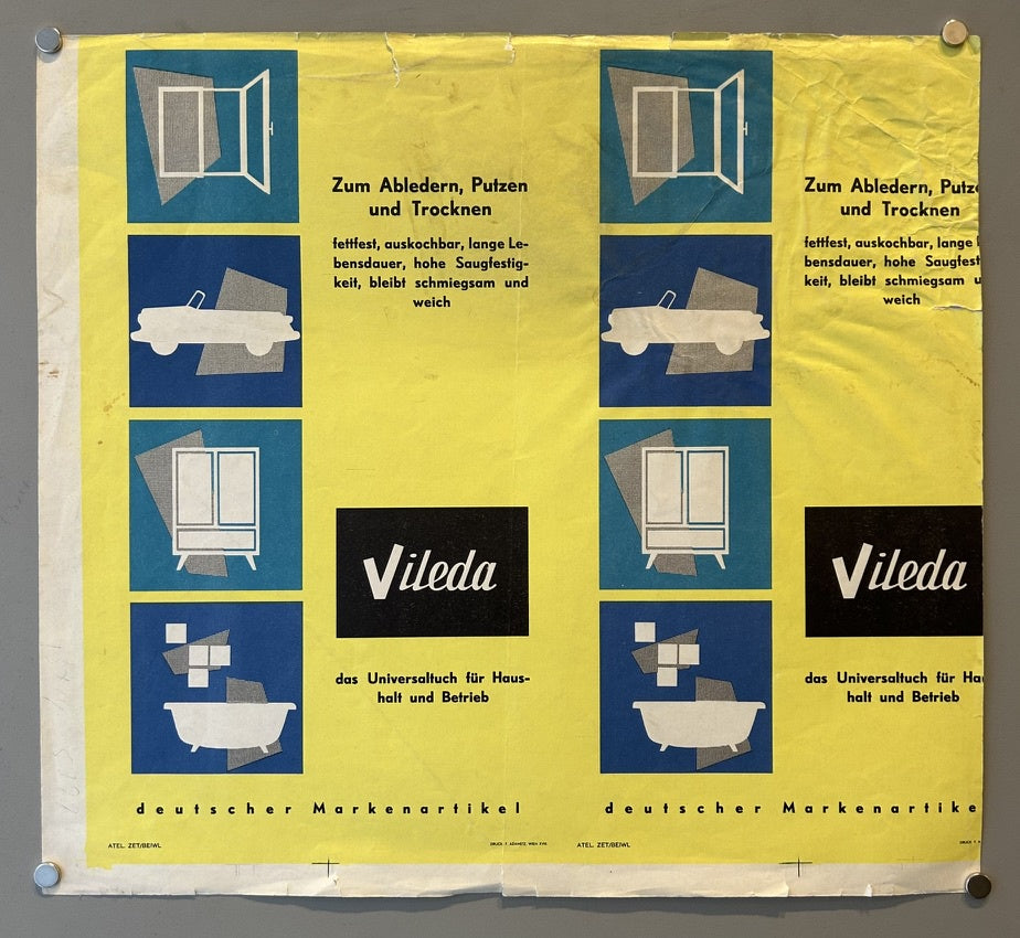 It Features a yellow background with blue and black squares. The squares depict various uses for the cloth, including cleaning windows, cars, furniture, and bathtubs. Text is in German and emphasizes the cloth's absorbency and durability. The Vileda logo is prominently displayed in the center of the poster.