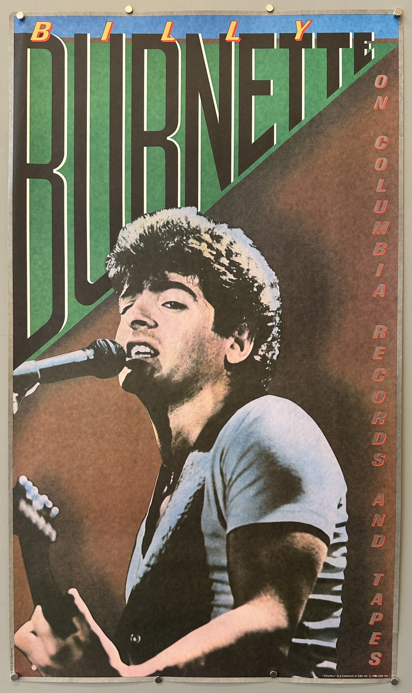 Billy Burnette, featuring a close-up illustration of him singing into a microphone with a guitar, alongside text reading 'BILLY BURNETTE ON COLUMBIA RECORDS AND TAPES
