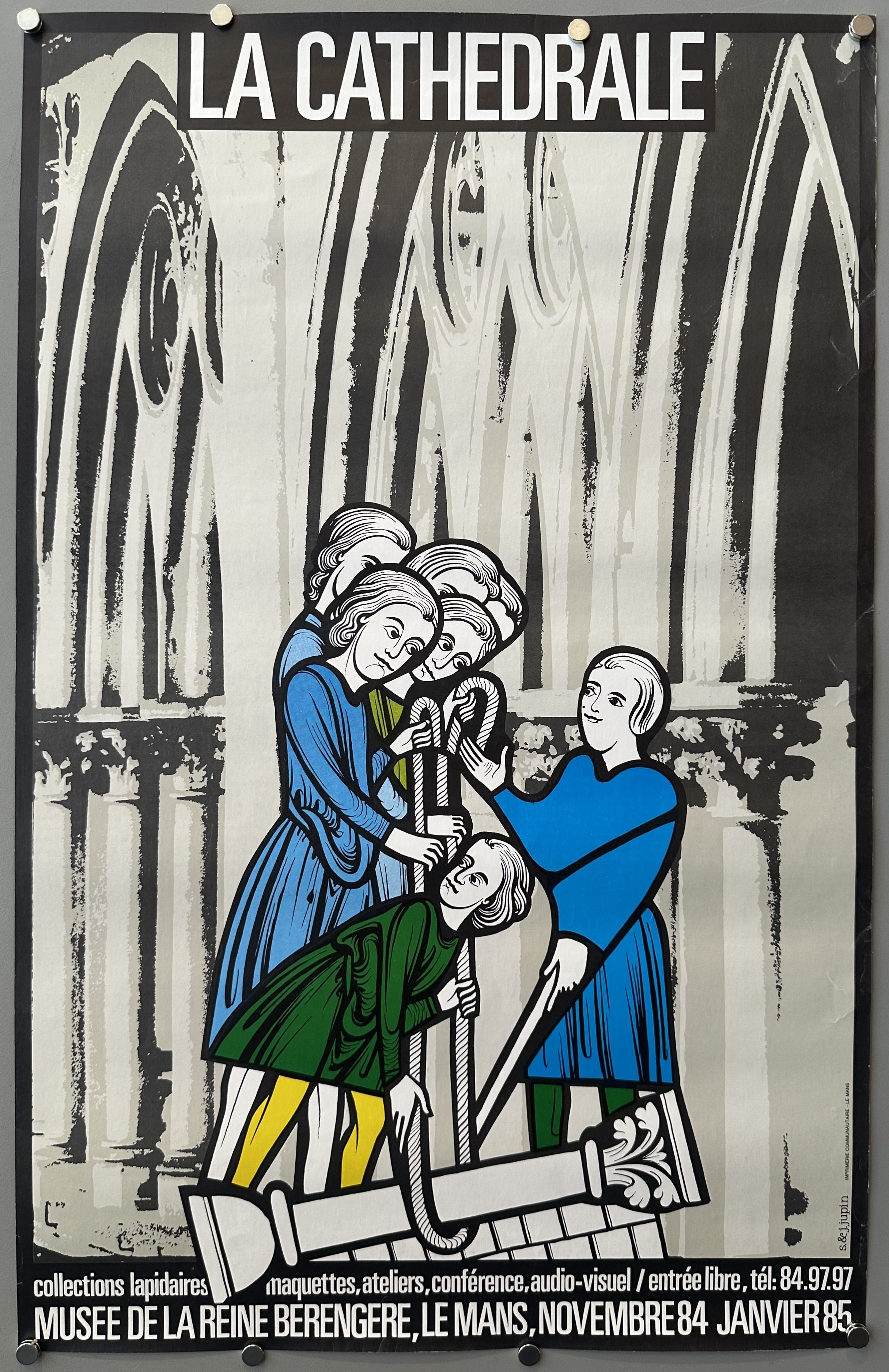 Medieval characters hoist a column up against a black and white cathedral in art exhibition poster.