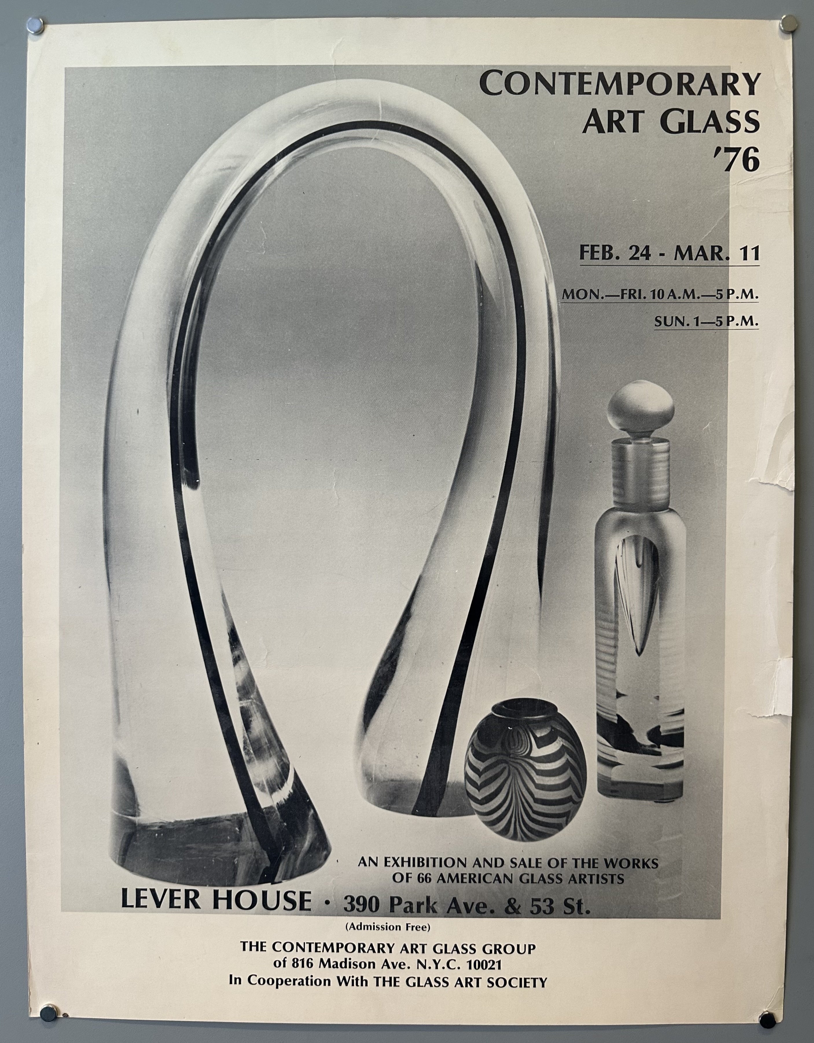 Black and white poster with photograph of three glass sculptures with black text.