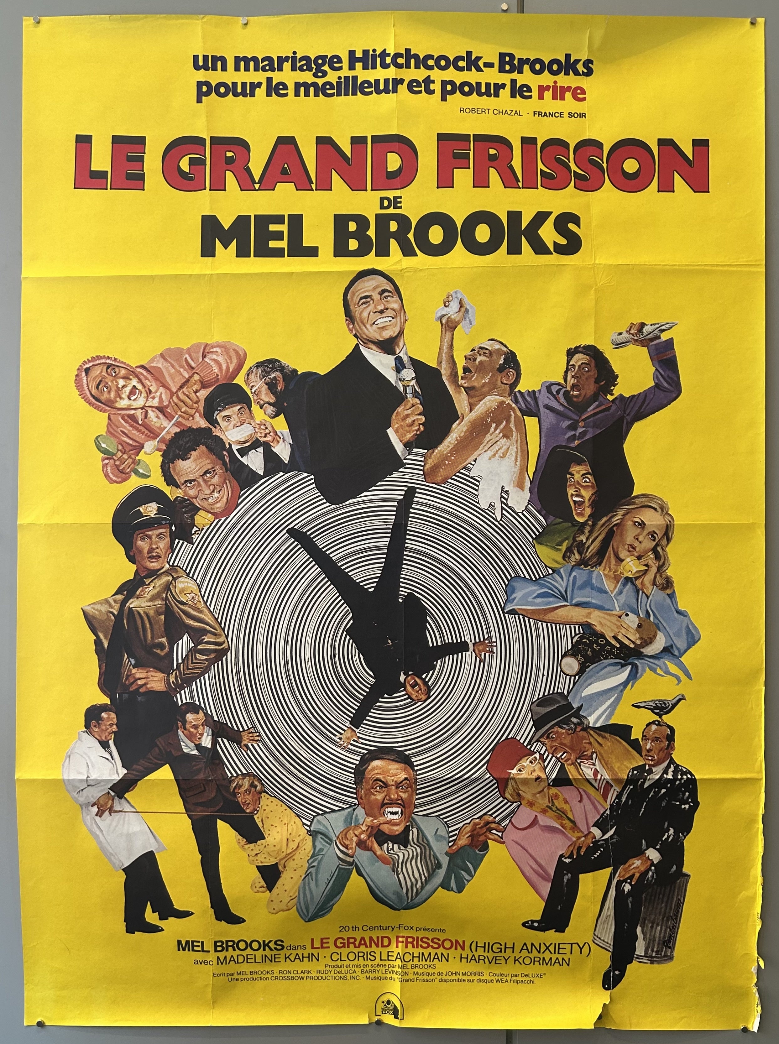 The poster for the movie "Le Grand Frisson," also known as "High Anxiety," is from 1977. This is the year the film was released.