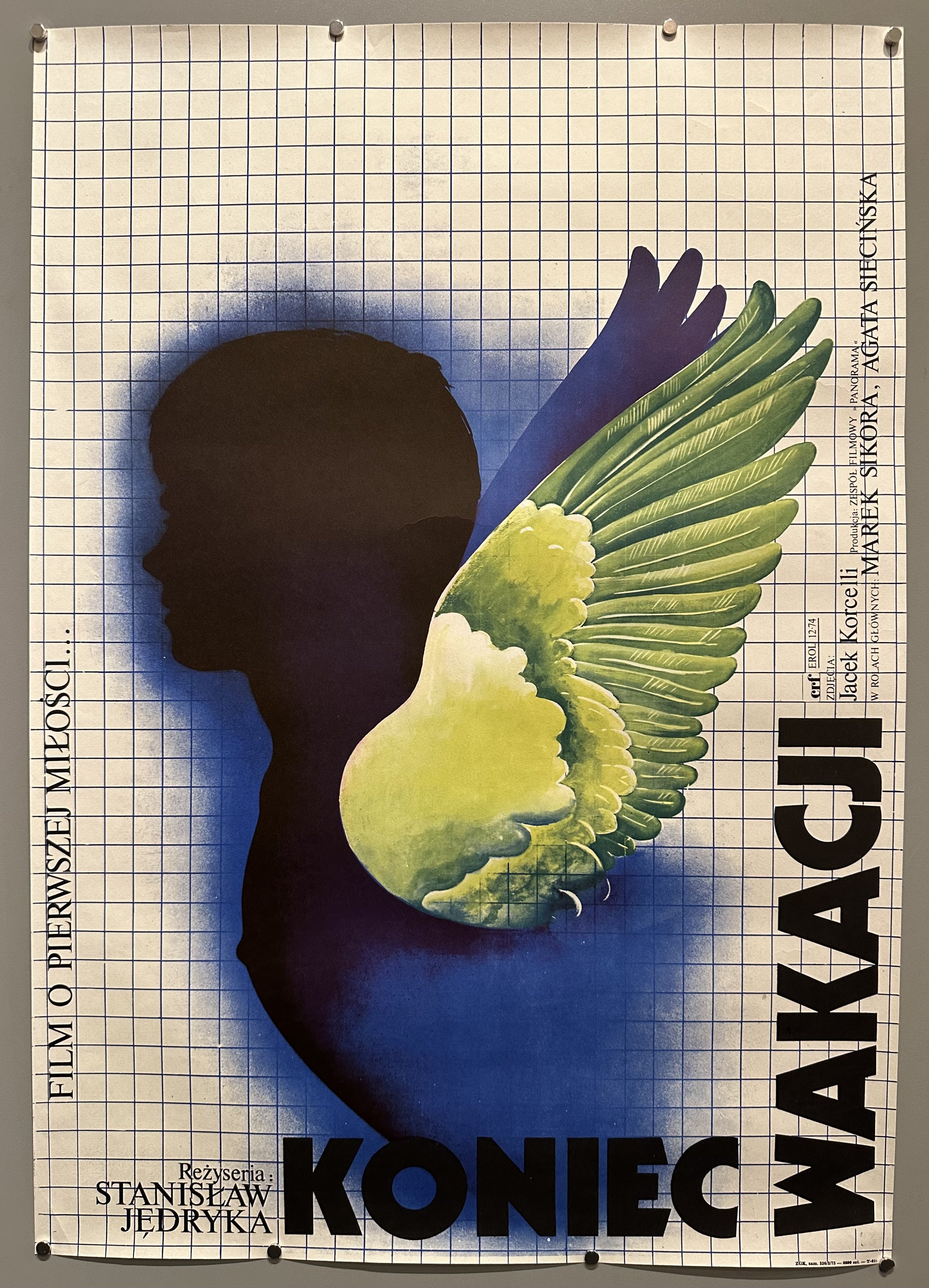 A Polish movie poster for 'Koniec Wakacji' (The End of the Holiday) from 1975. The poster features a silhouette of a child with large, colorful wings, with Polish text overlaying the image.