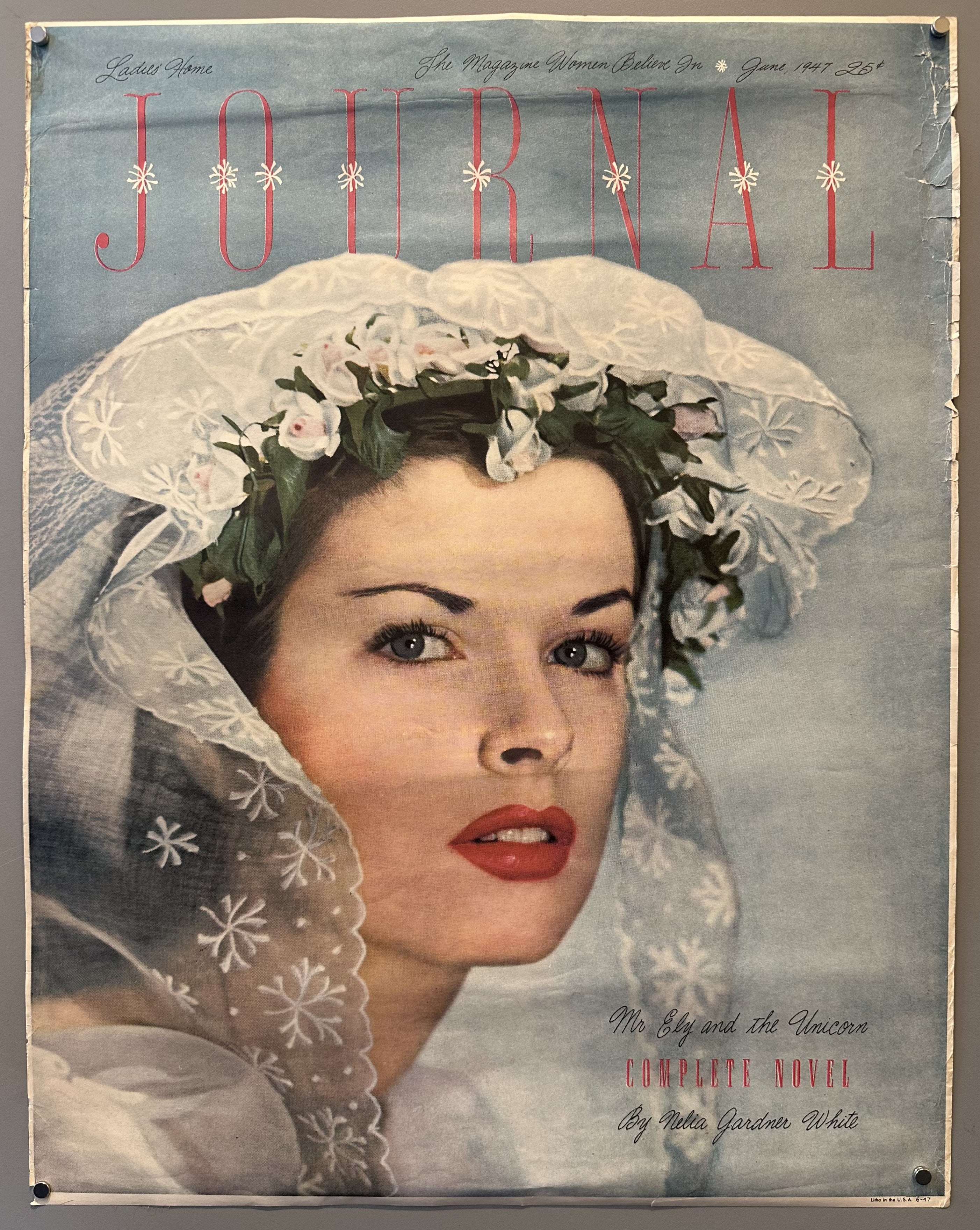 Illustrated portrait of a woman against blue background with red and black accent text.