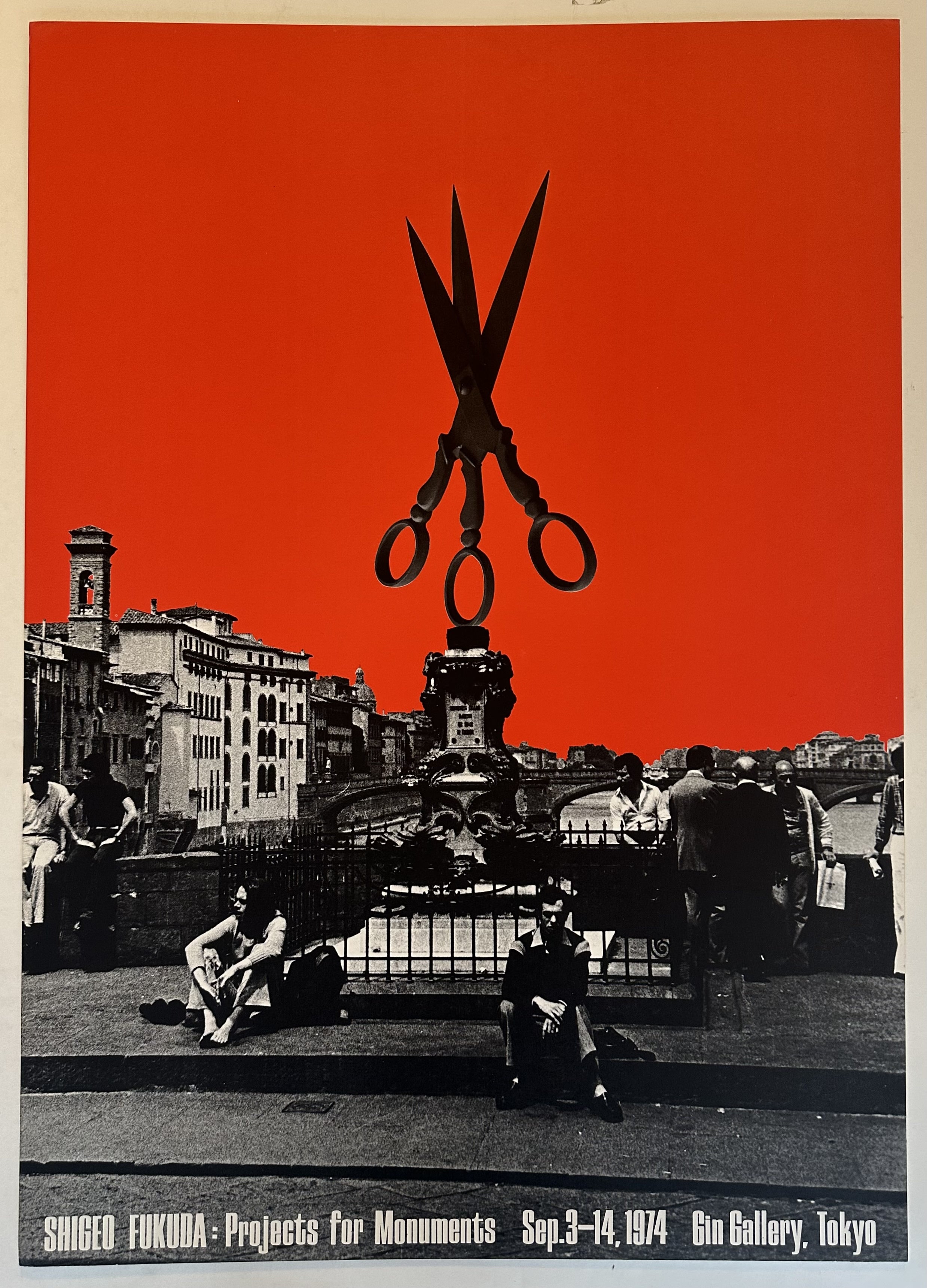 A poster for Shigeo Fukuda's "Projects for Monuments" exhibition in 1974 at the Gin Gallery in Tokyo. The poster features a black and white photo of a cityscape with a large pair of scissors.