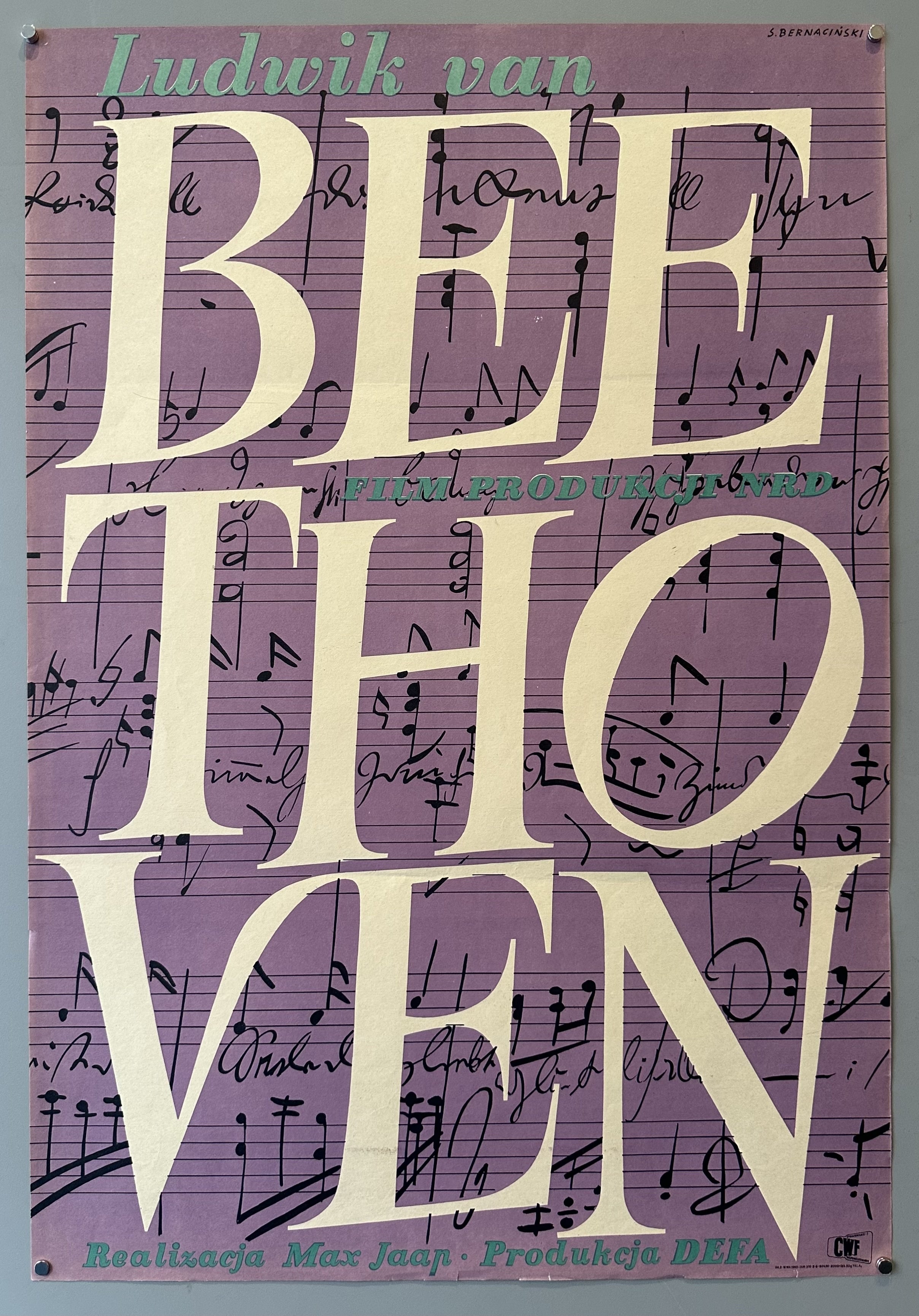 Purple poster with music notes and Beethoven's name written in large white text for Polish film.