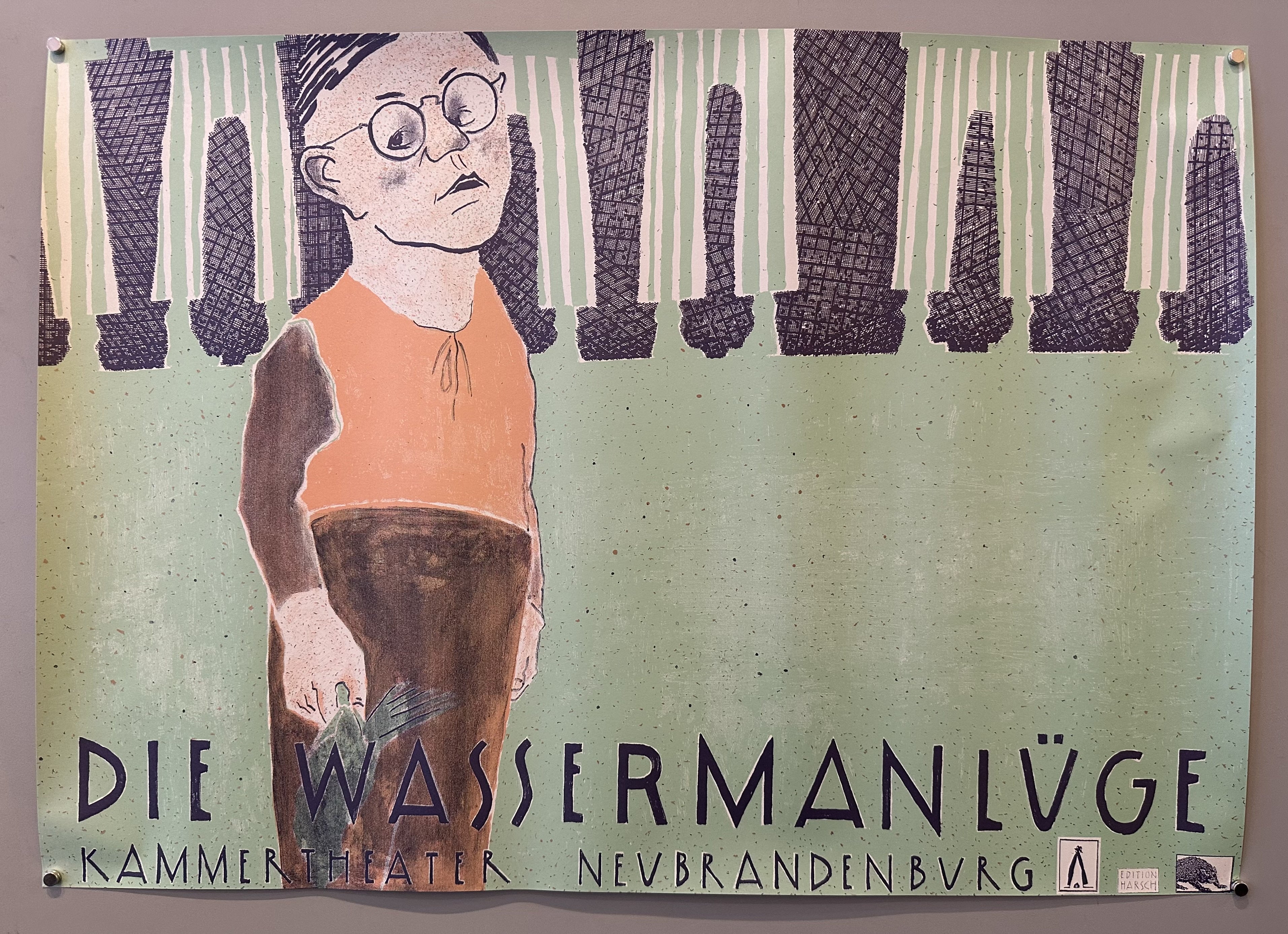 Green poster with illustrated character to promote puppet theater production of 'Die Wasserman Lüge'.