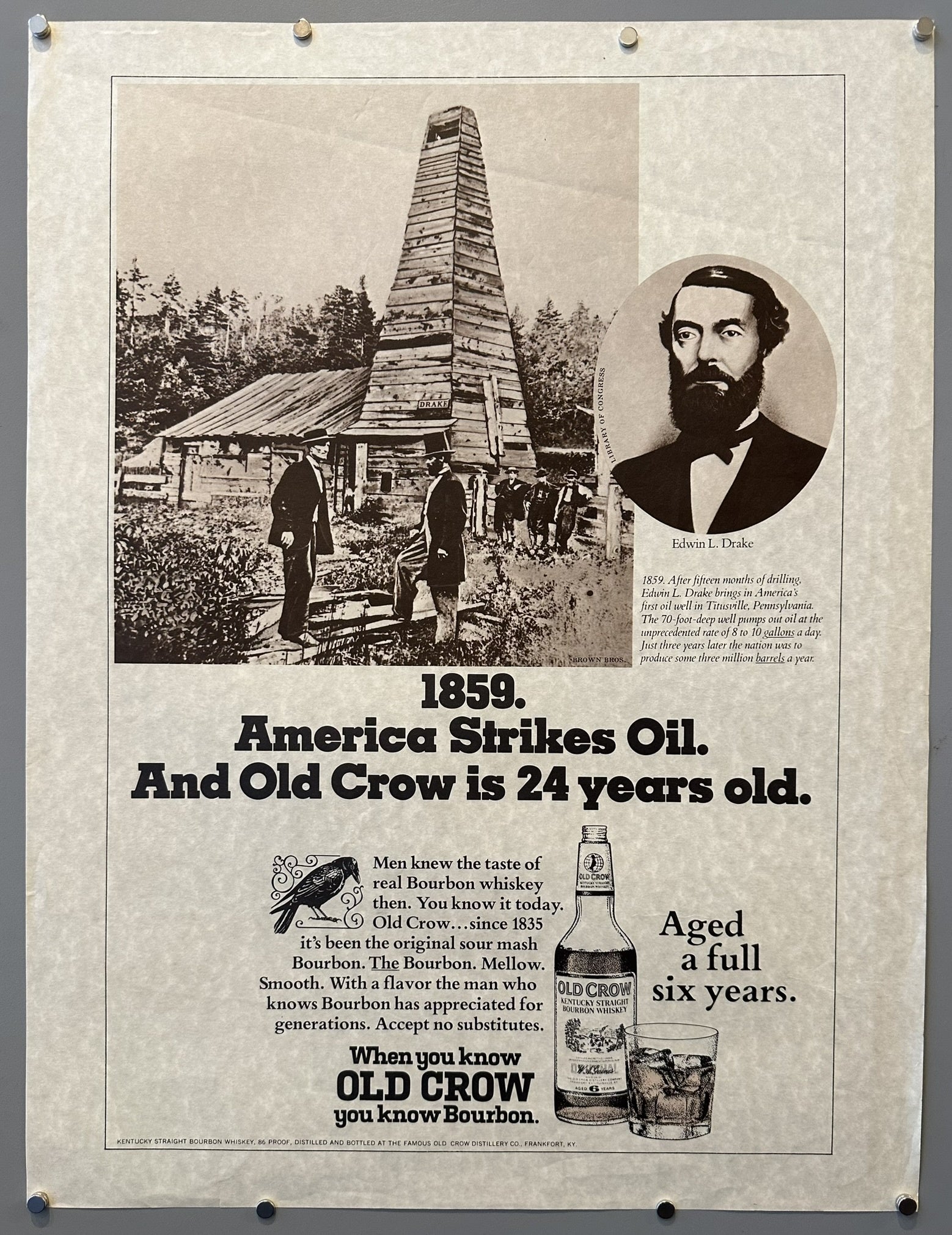 An advertisement featuring a central illustration of an early oil derrick and surrounding landscape, with a portrait of Edwin L. Drake to the right, and a bottle of Old Crow Bourbon and a glass with ice below