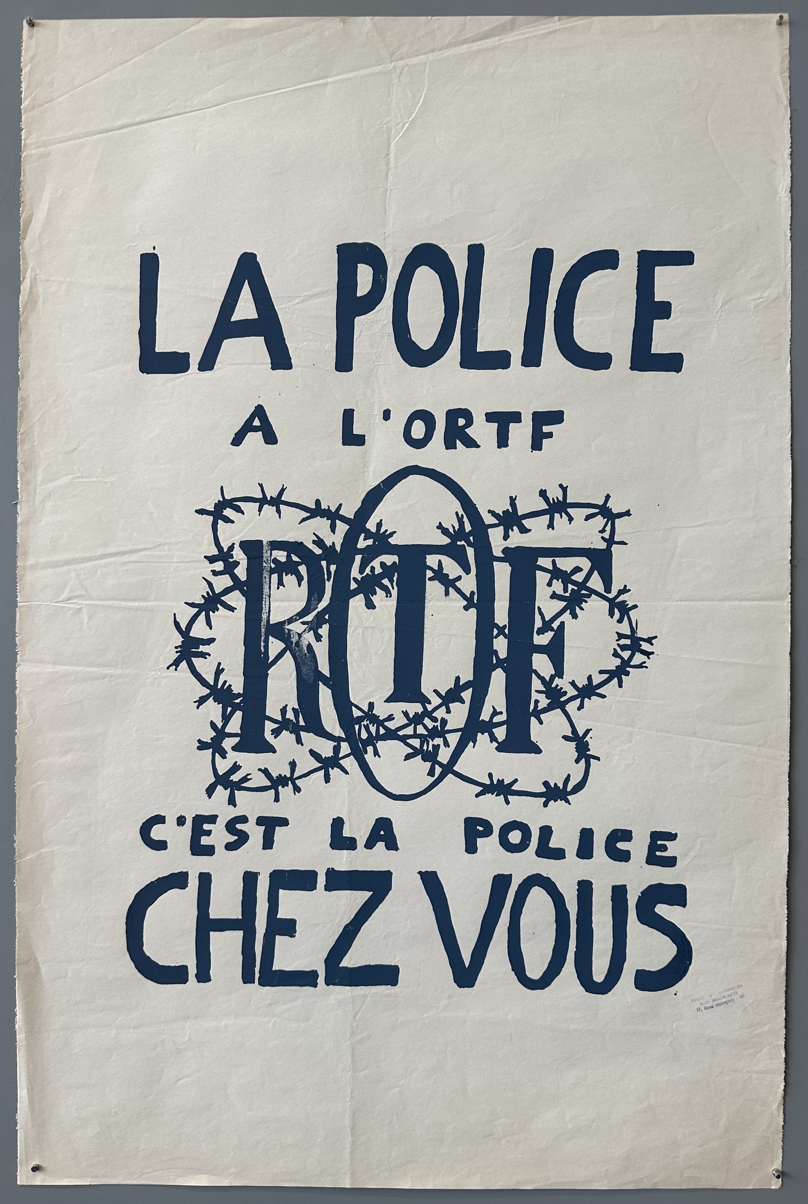 ORTF surrounded by barbed wires with normal text above and below it for Mai 68 propaganda poster.