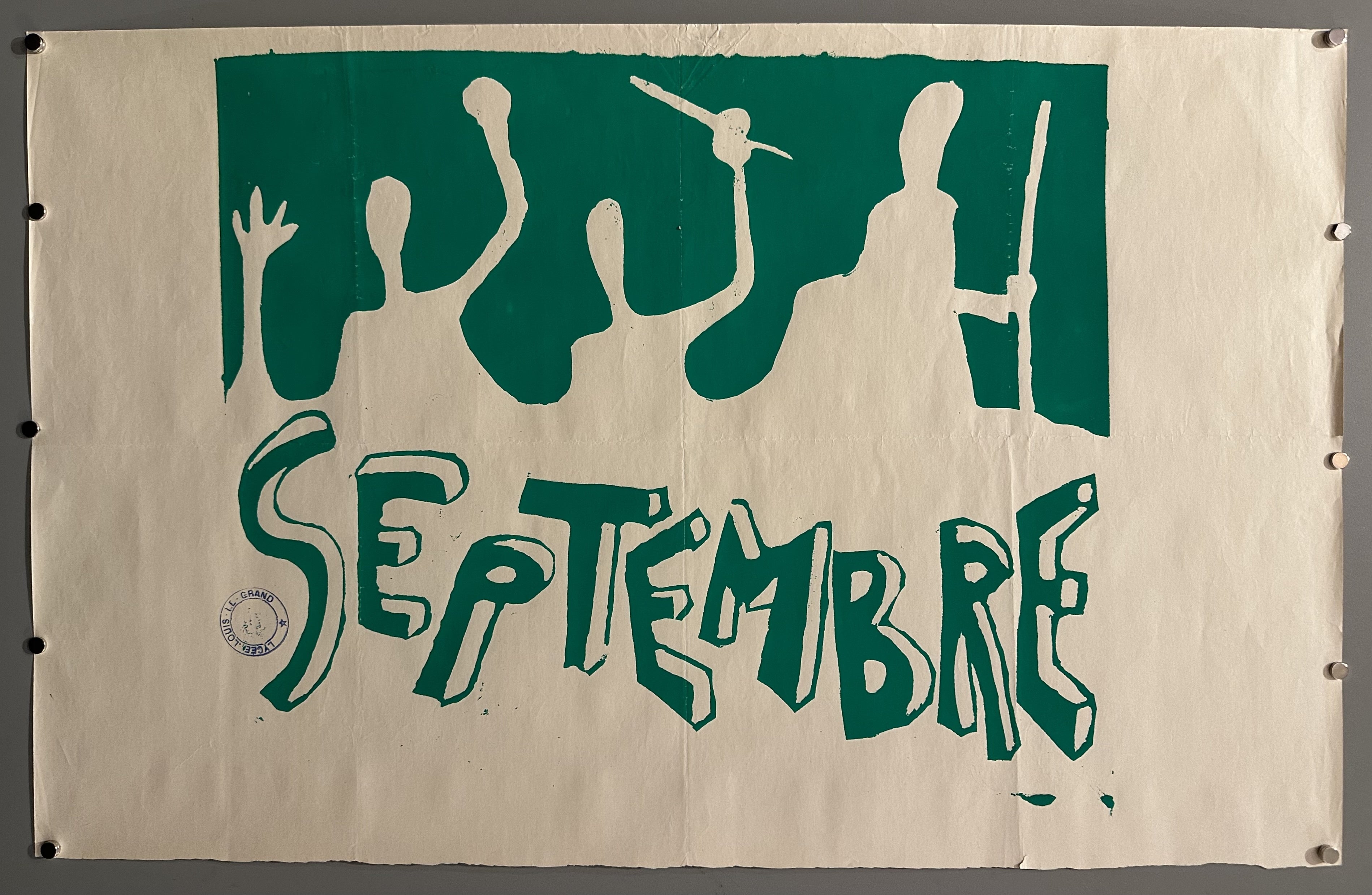 Horizontal poster with green design of blank figures and block letters spelling out 'Septembre'.