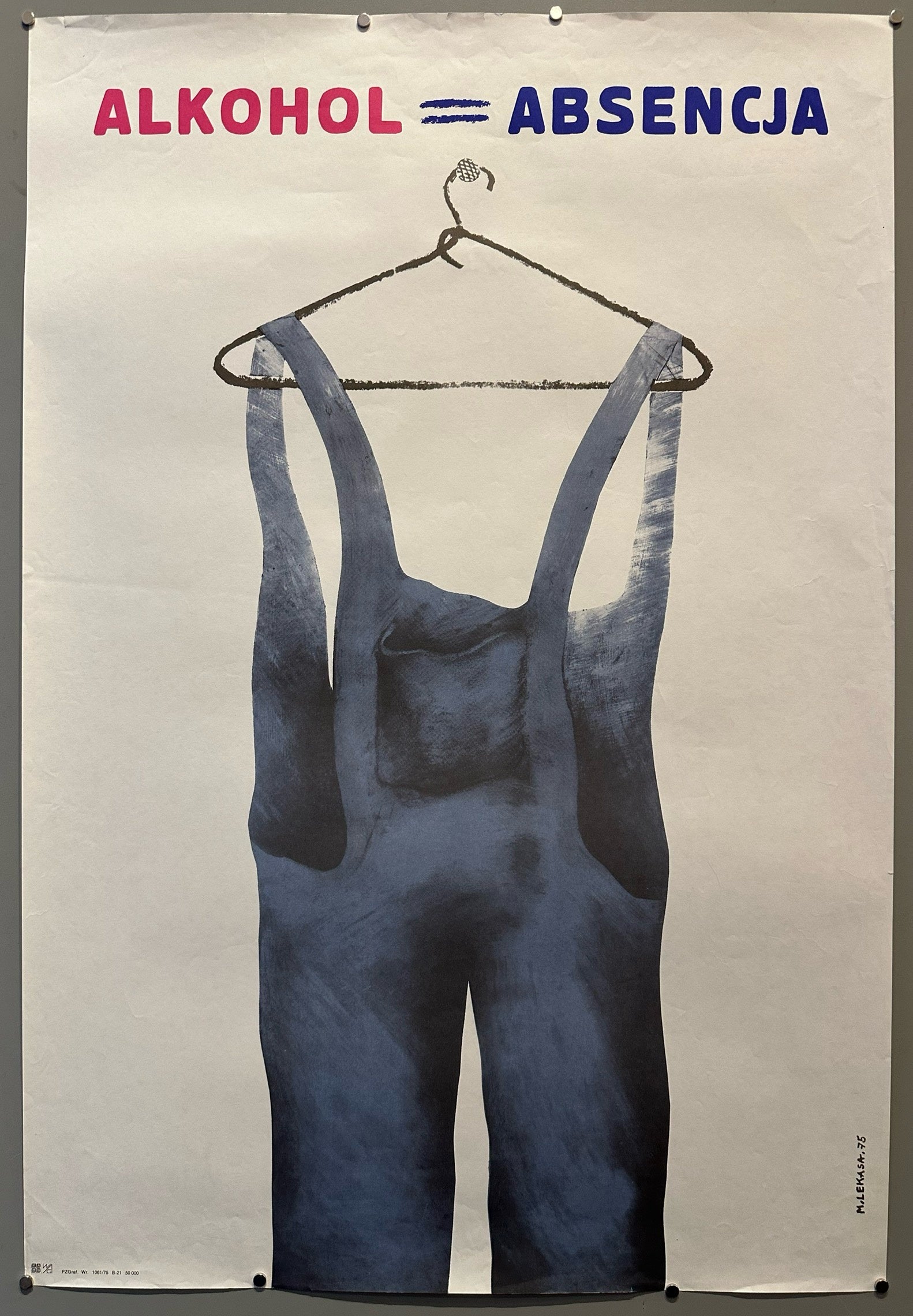 A pair of overalls are on a hanger to symbolize the absence of a parent in this Polish poster.