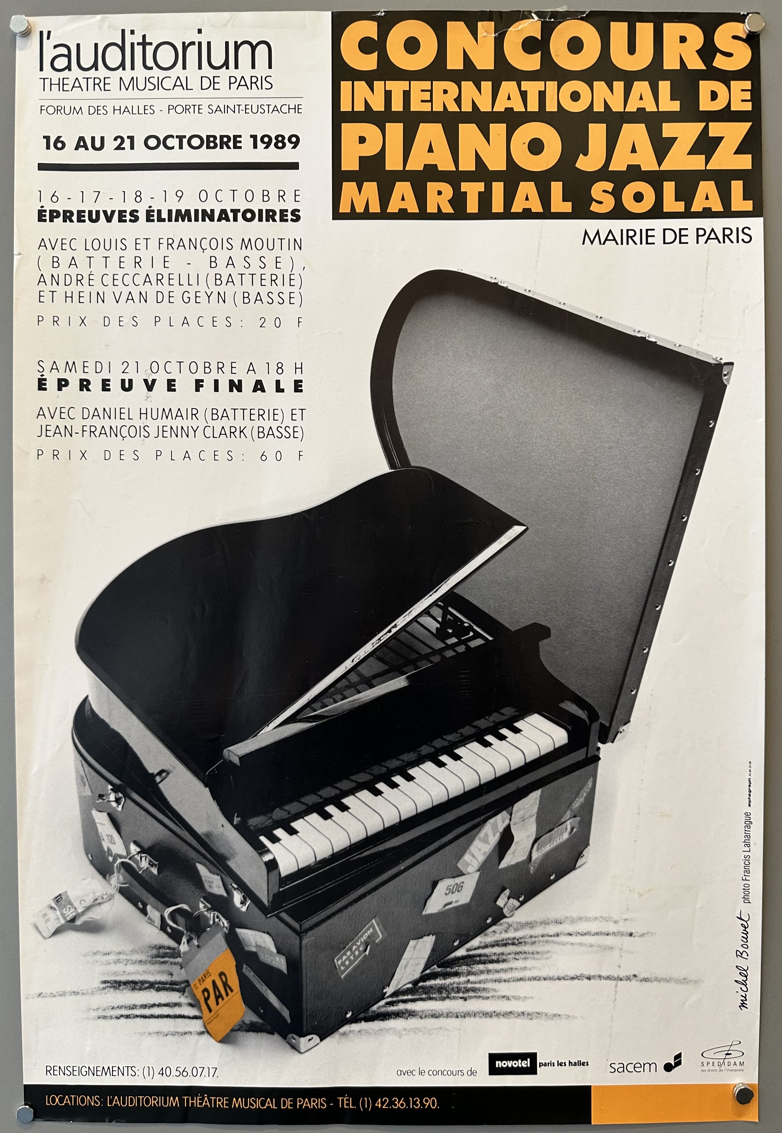 Photograph of a suitcase being opened to reveal a piano to promote a French music competition at Paris City Hall.