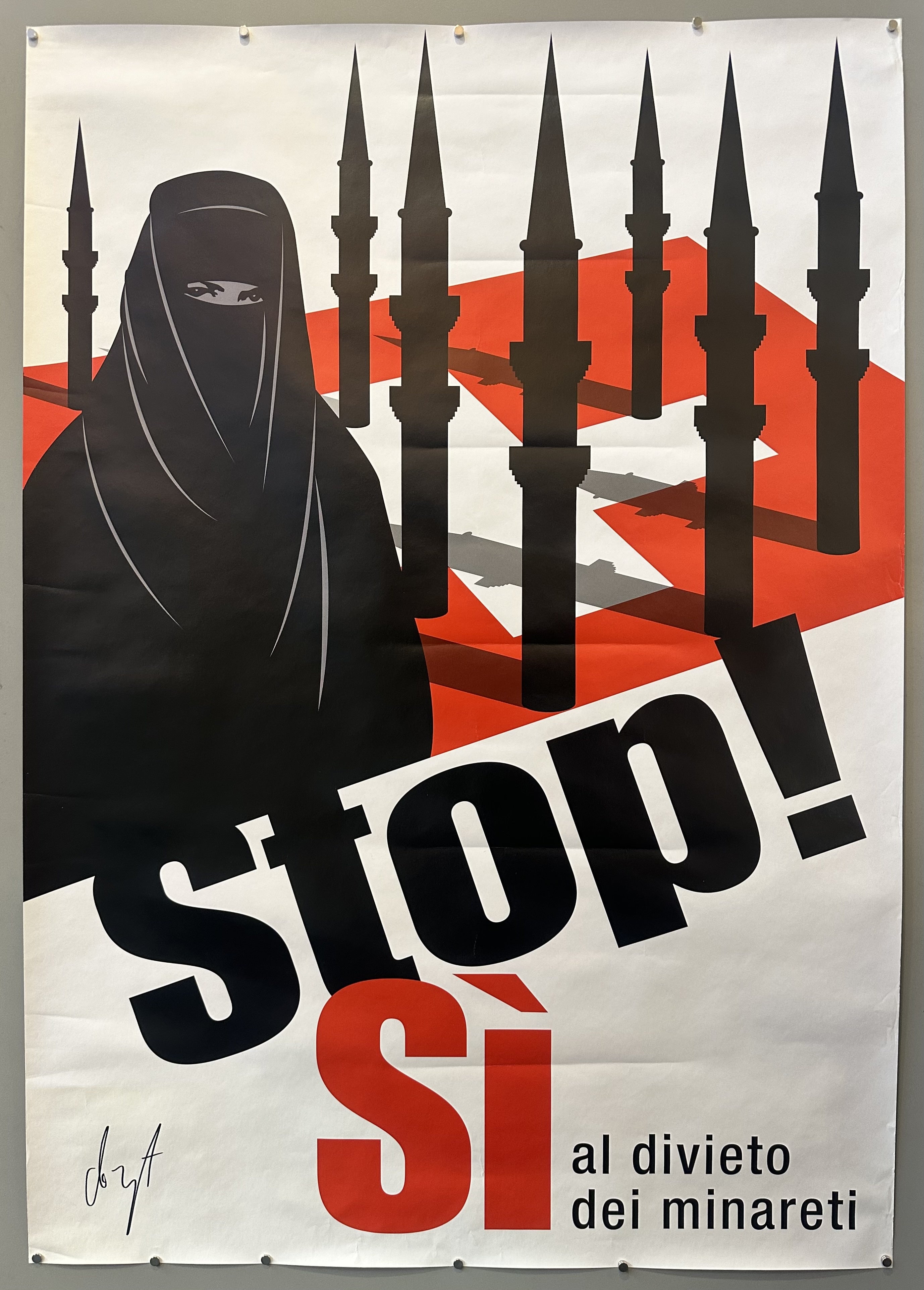 The poster used minarets rising from the Swiss flag like missiles . . . Beside the missiles a woman glowers from inside a niqab. ‘Stop’ is written below in big, fire-engine-red letters.