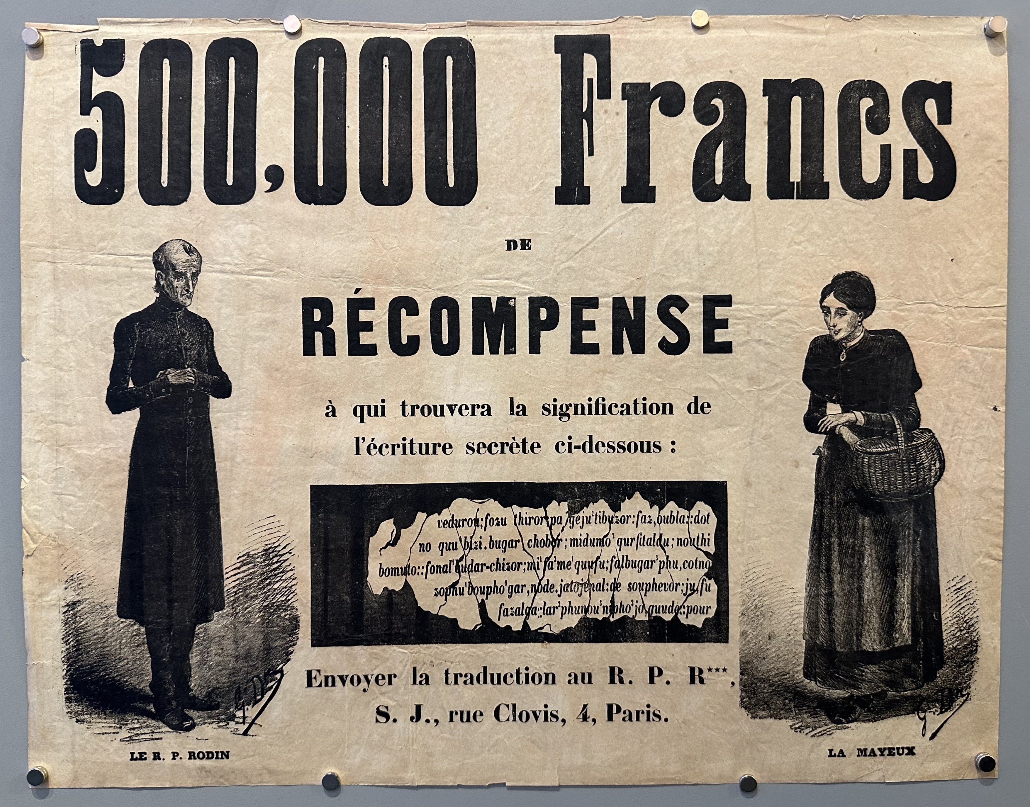 Black French text with a torn piece of paper with text below it and two figures standing on either side of it.