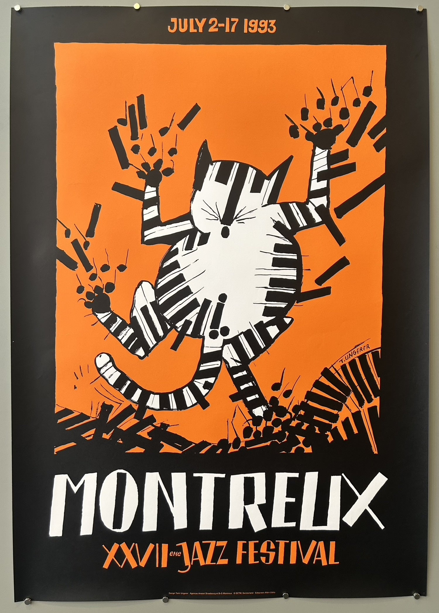 This poster is from Montreux, Switzerland, as it's the official poster for the Montreux Jazz Festival. This renowned annual music festival takes place on the shores of Lake Geneva in Montreux.