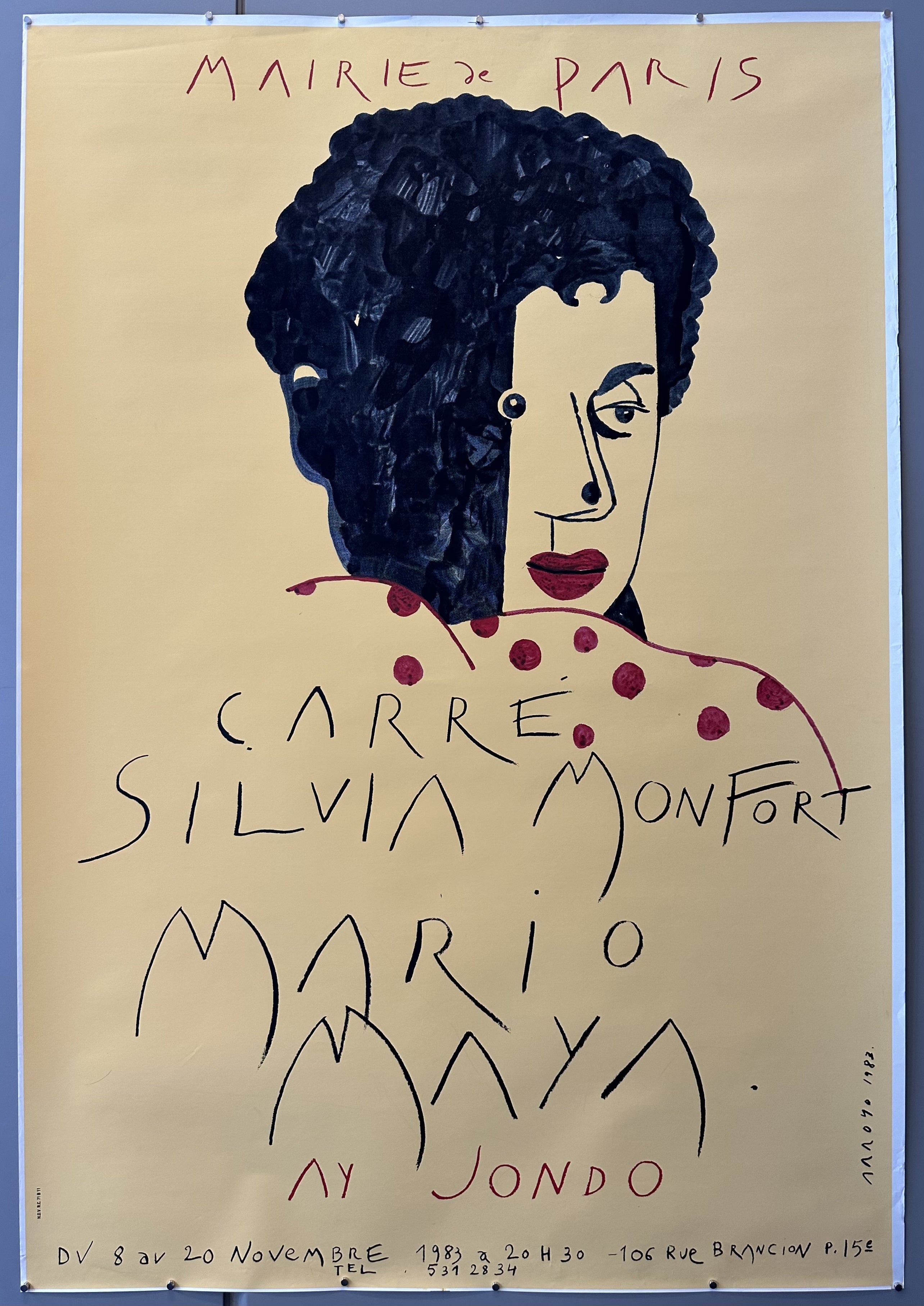 Cream colored poster with woman posing over handwriting text for flamenco dance performance at French theater.