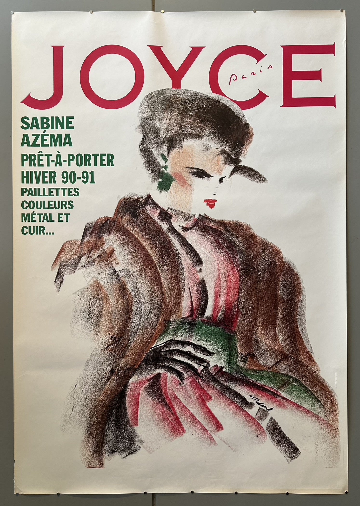 A vintage French fashion poster for "JOYCE Paris" magazine, featuring an illustration of a woman in a stylish winter outfit, with text promoting "SABINE AZÉMA PRÊT-À-PORTER HIVER 90-91" and details about "PAILLETTES COULEURS MÉTAL ET CUIR...