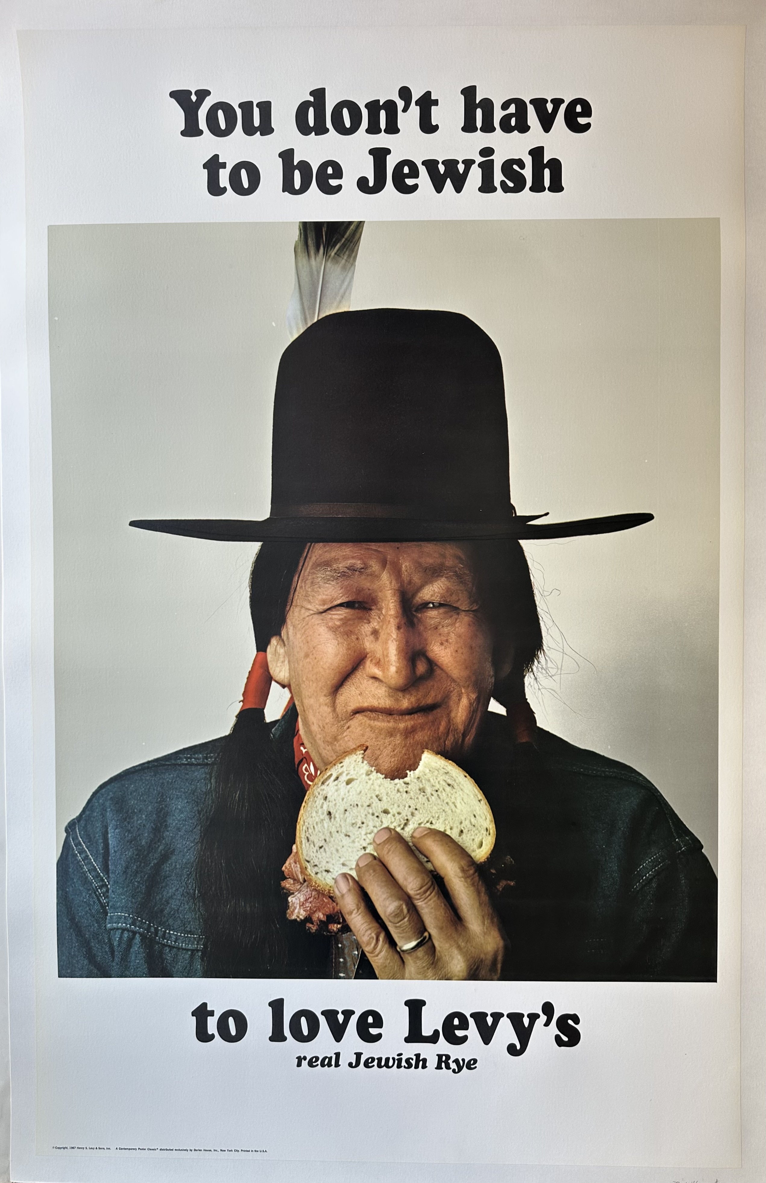 A man eats a sandwich