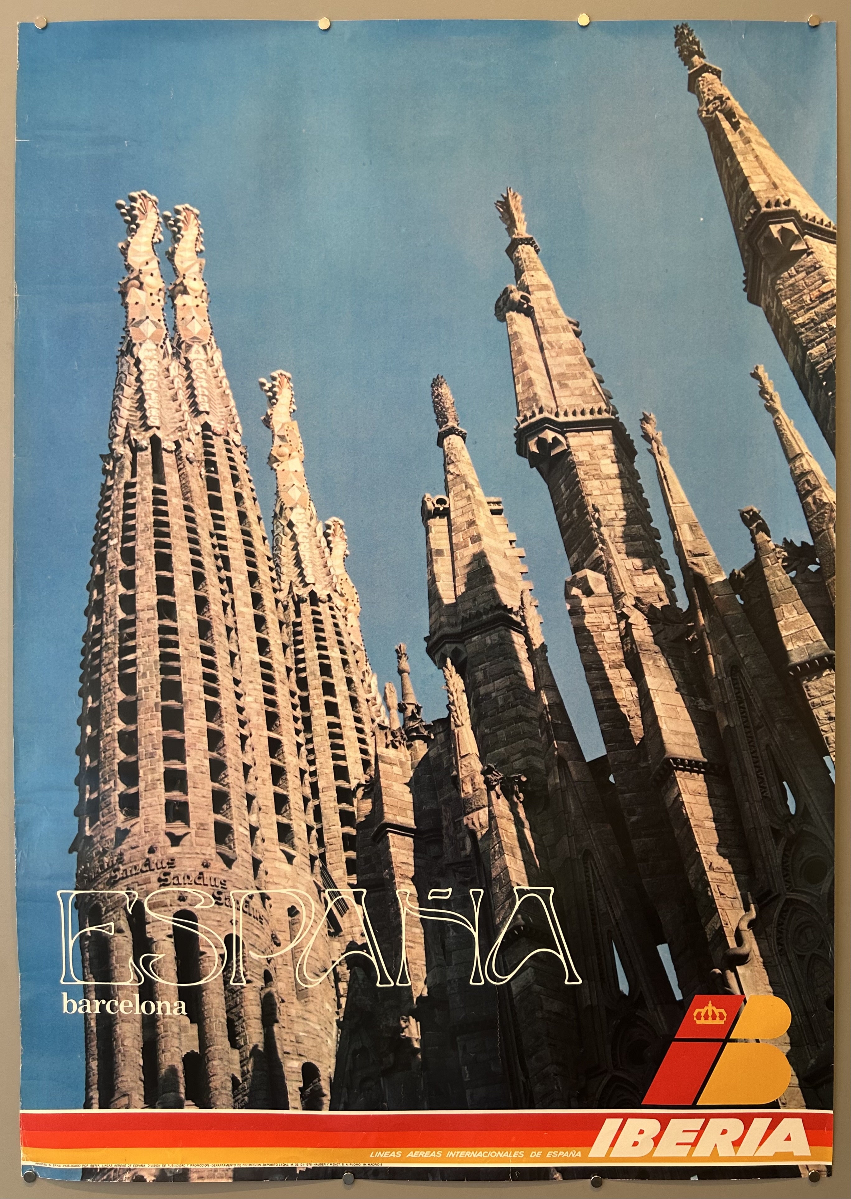 Photograph of Sagrada Famiia on vintage travel poster, Iberia logo at bottom right-hand side.