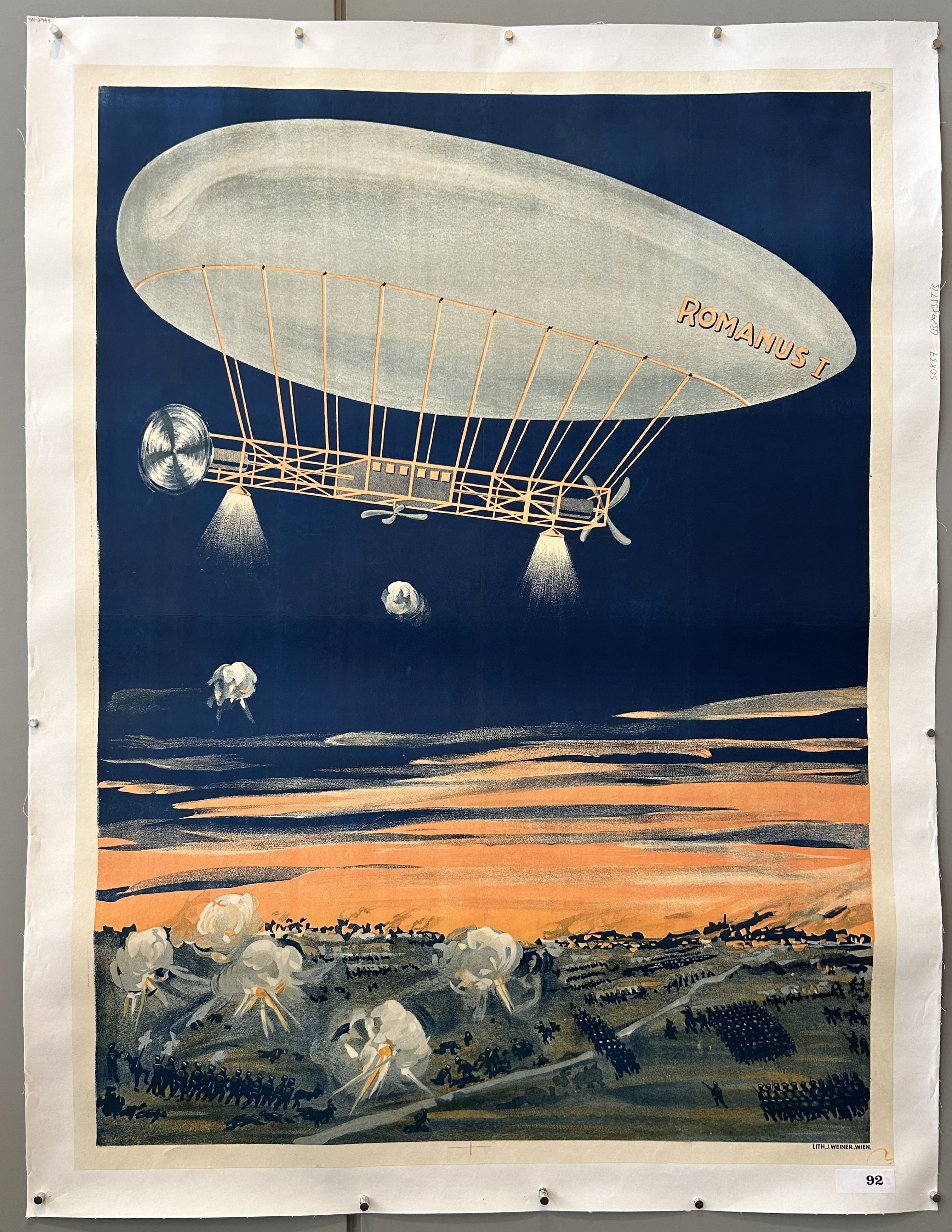 Blimp over field of soldiers
