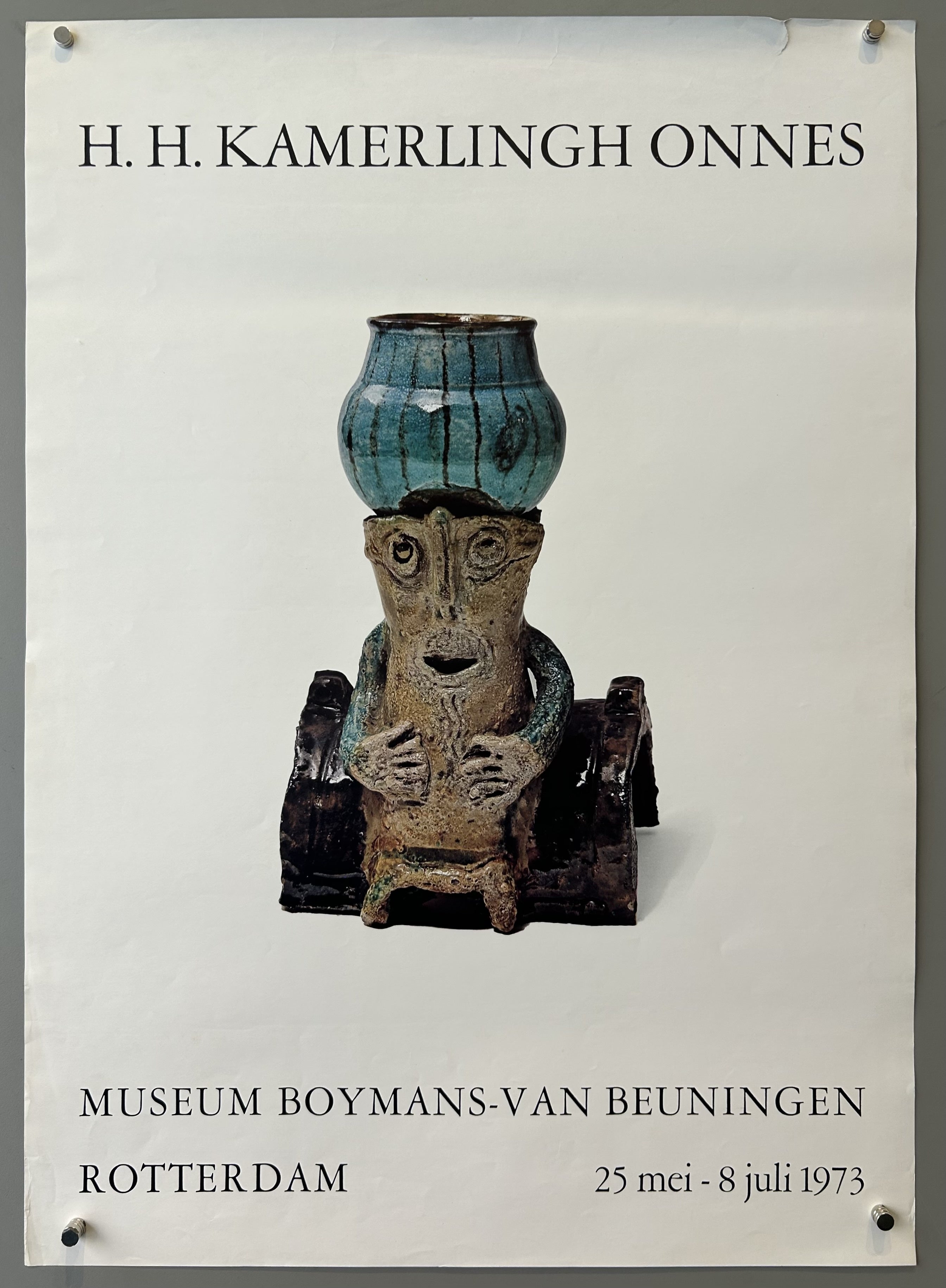 Sculpture in the middle  with writing about the exhibition