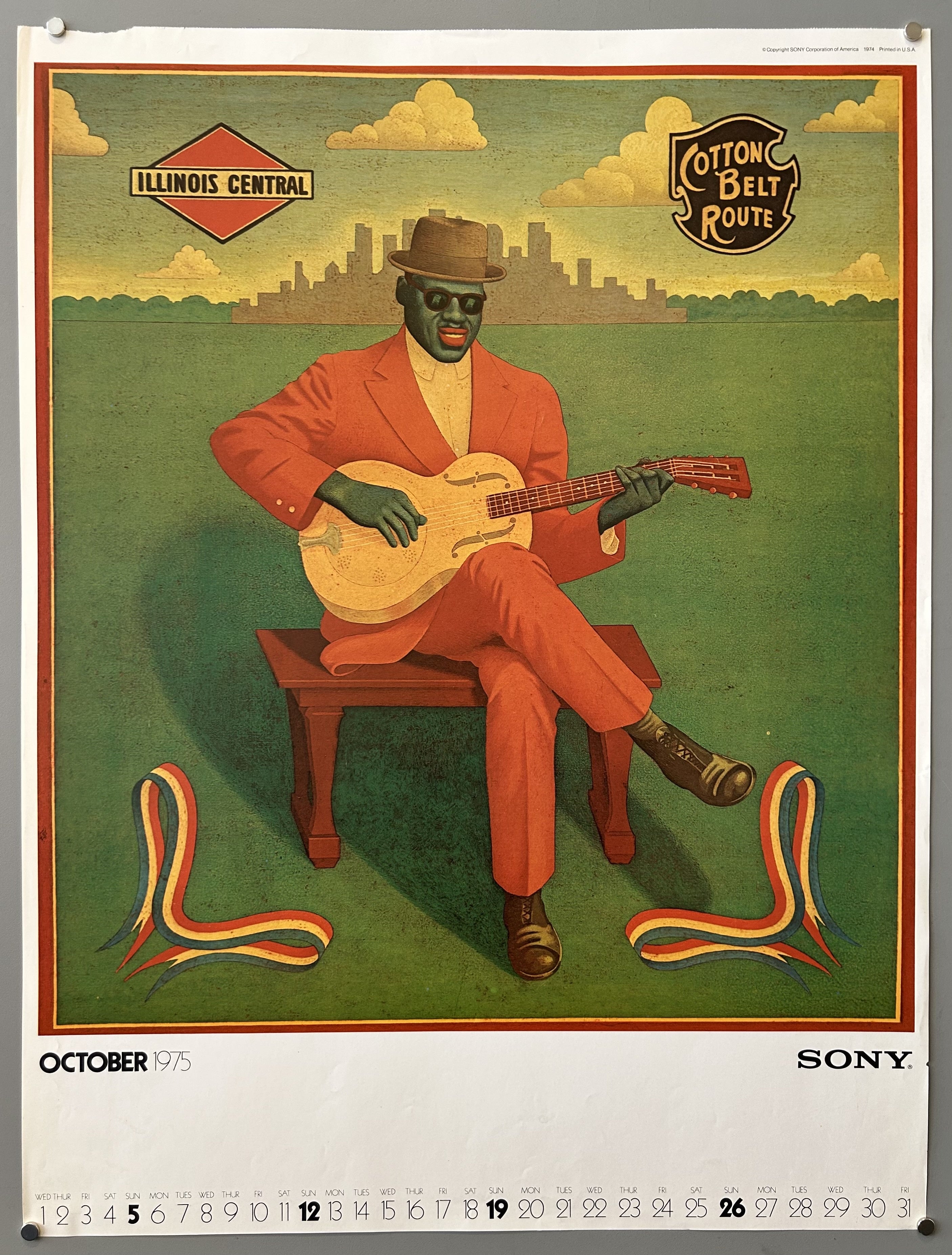 guitar player sits on a bench
