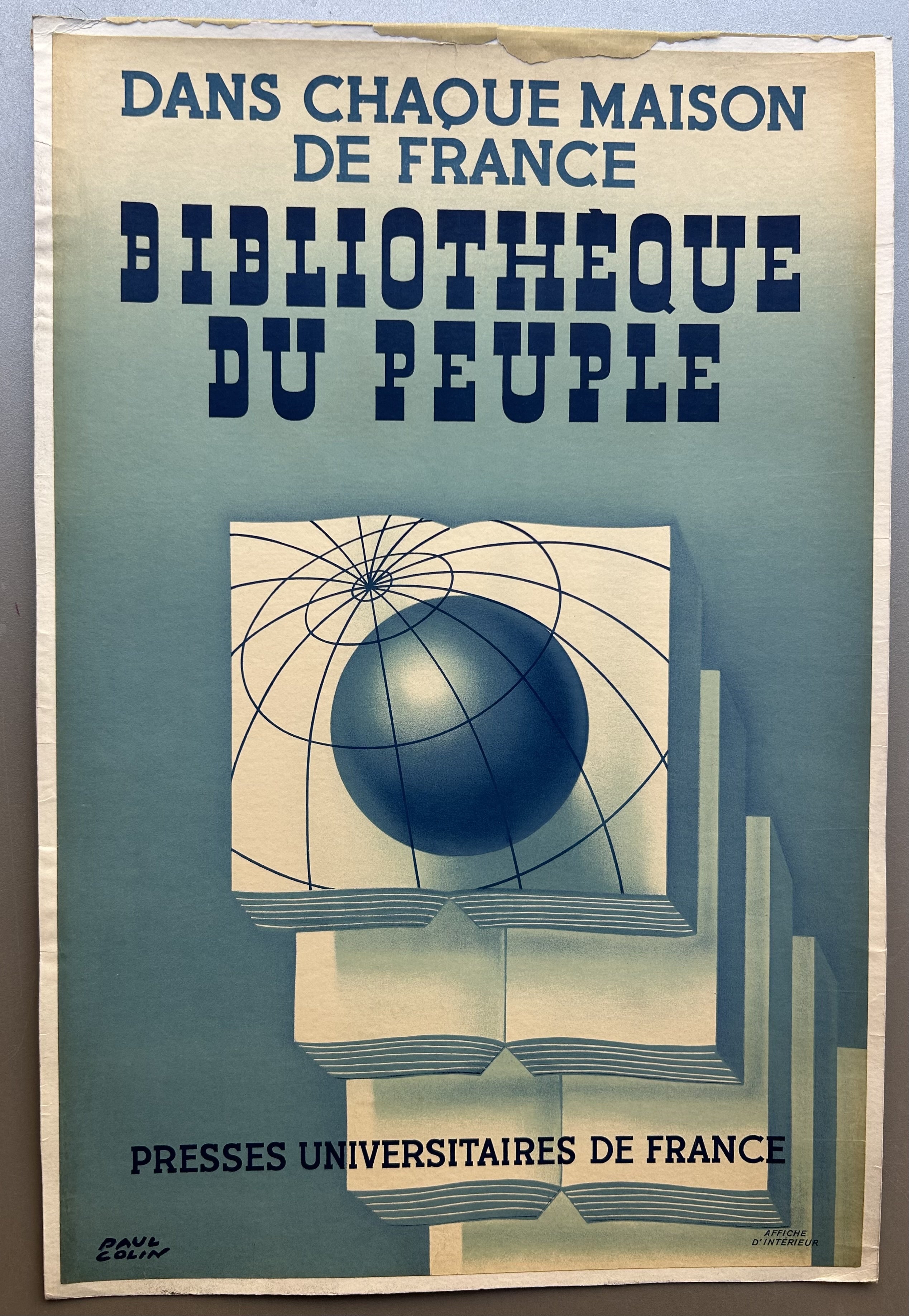 Stylised artwork in blue by the notable French poster artist Paul Colin (1892-1985) depicting a stack of books with a globe on the top book and the text above and below.