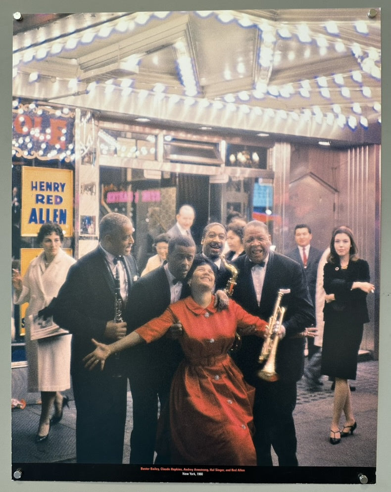 A portrait of Mahalia Jackson, known as the Queen of Gospel, laughing joyfully. She is wearing a light-colored dress and a prominent, sparkling brooch on her chest
