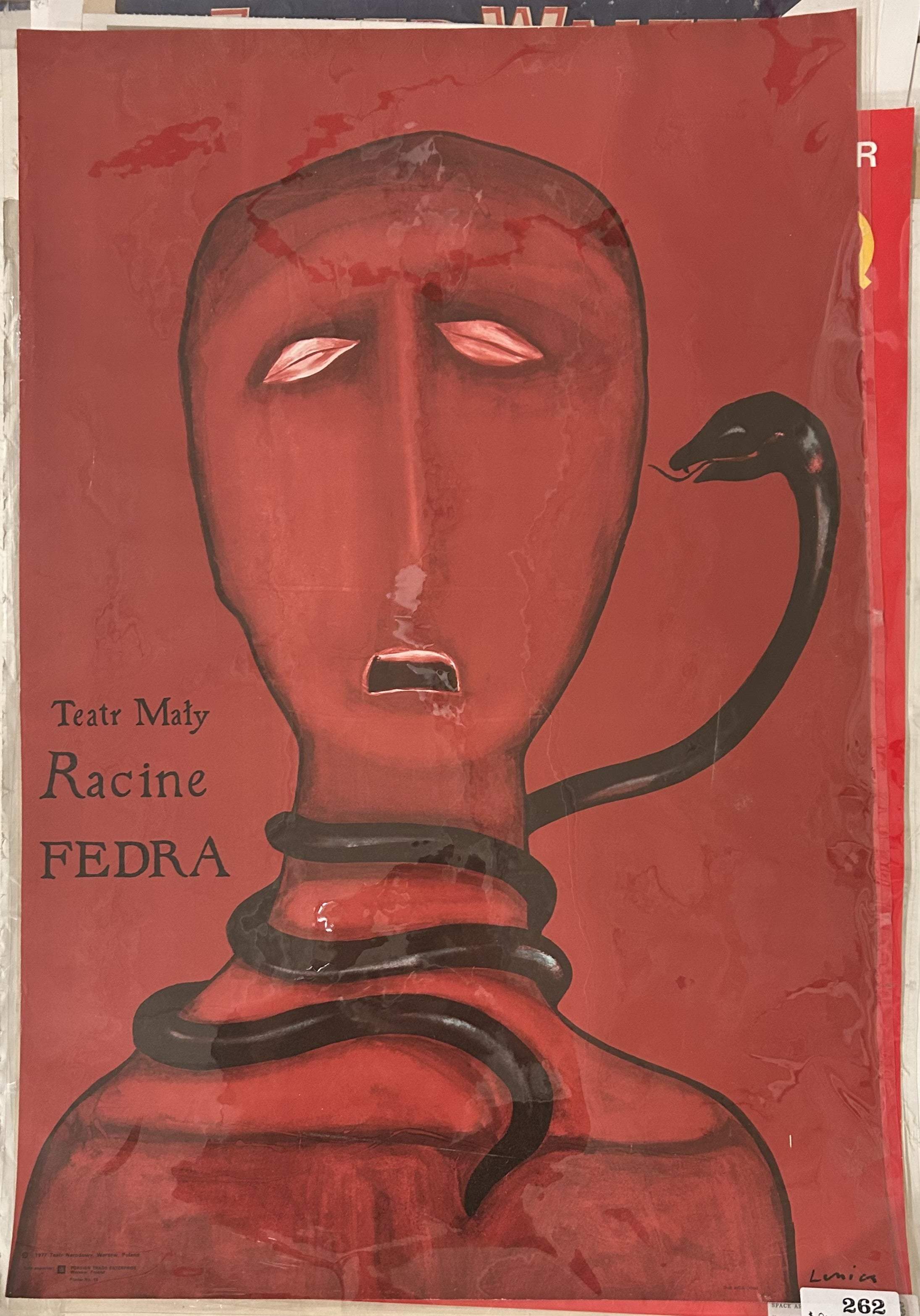 red background cand woman with a snake