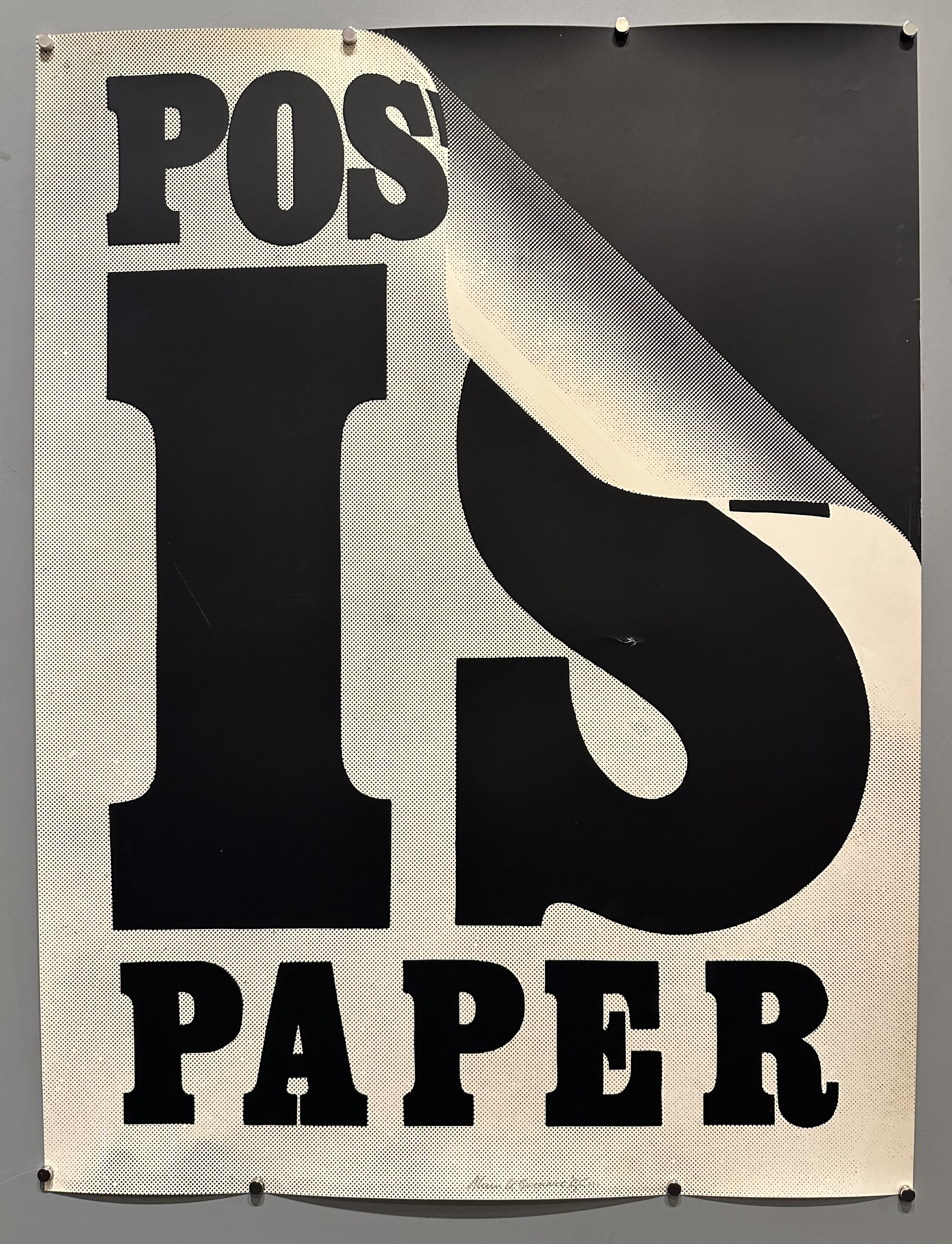 Black border with black text 'Poster is Paper' against white background.