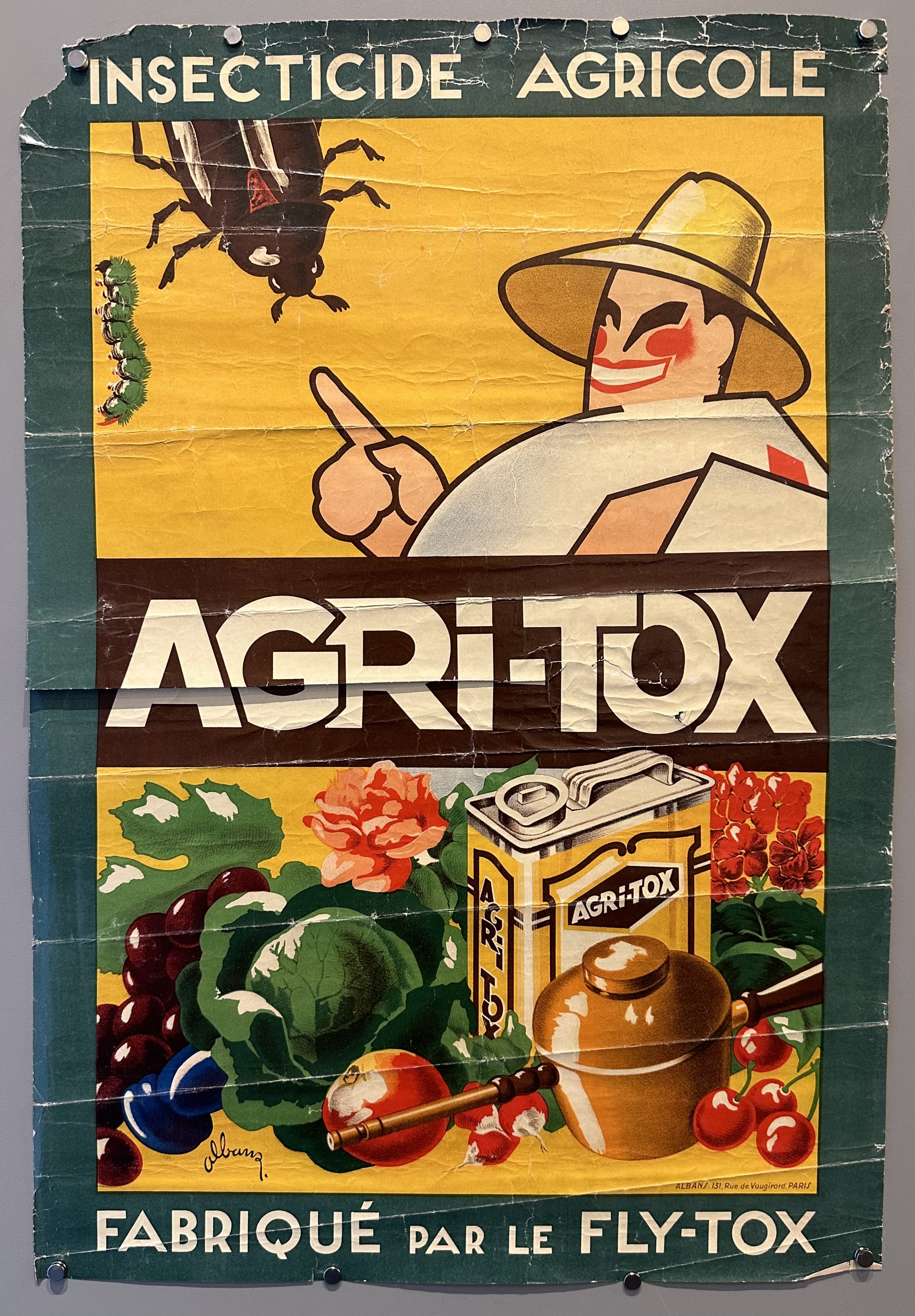 Illustrated man points at bugs with fruits and agri-tox product beneath him with green border and white text.