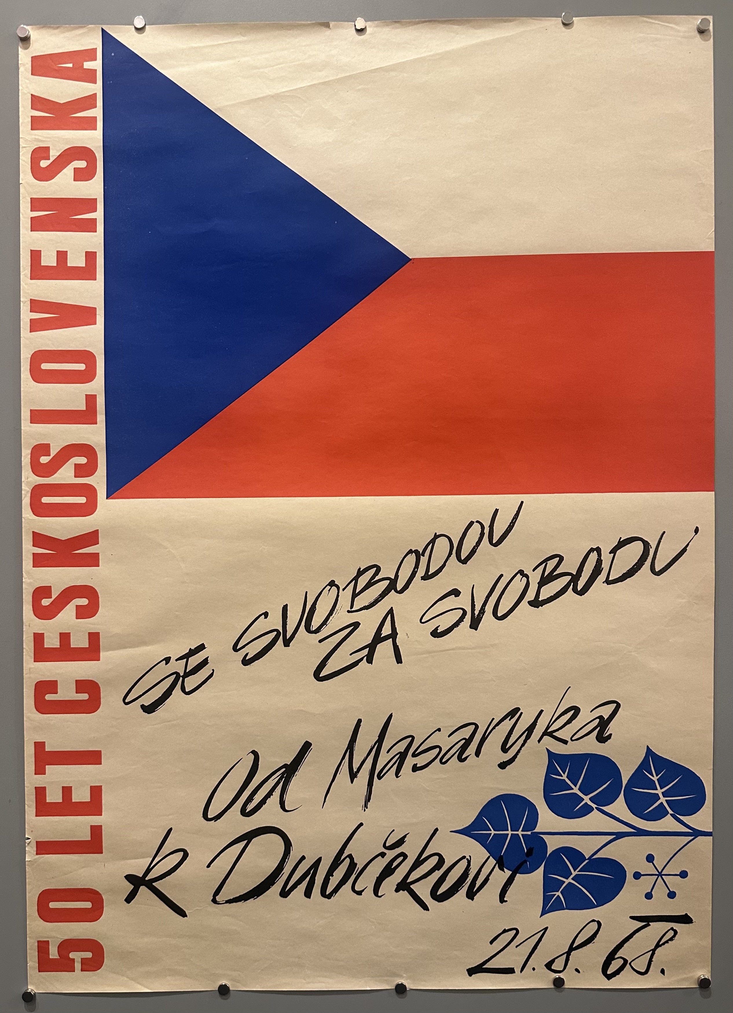 The Czech flag takes up half of this poster, with the other half occupied by cursive text showing support to the protestors of May 68.