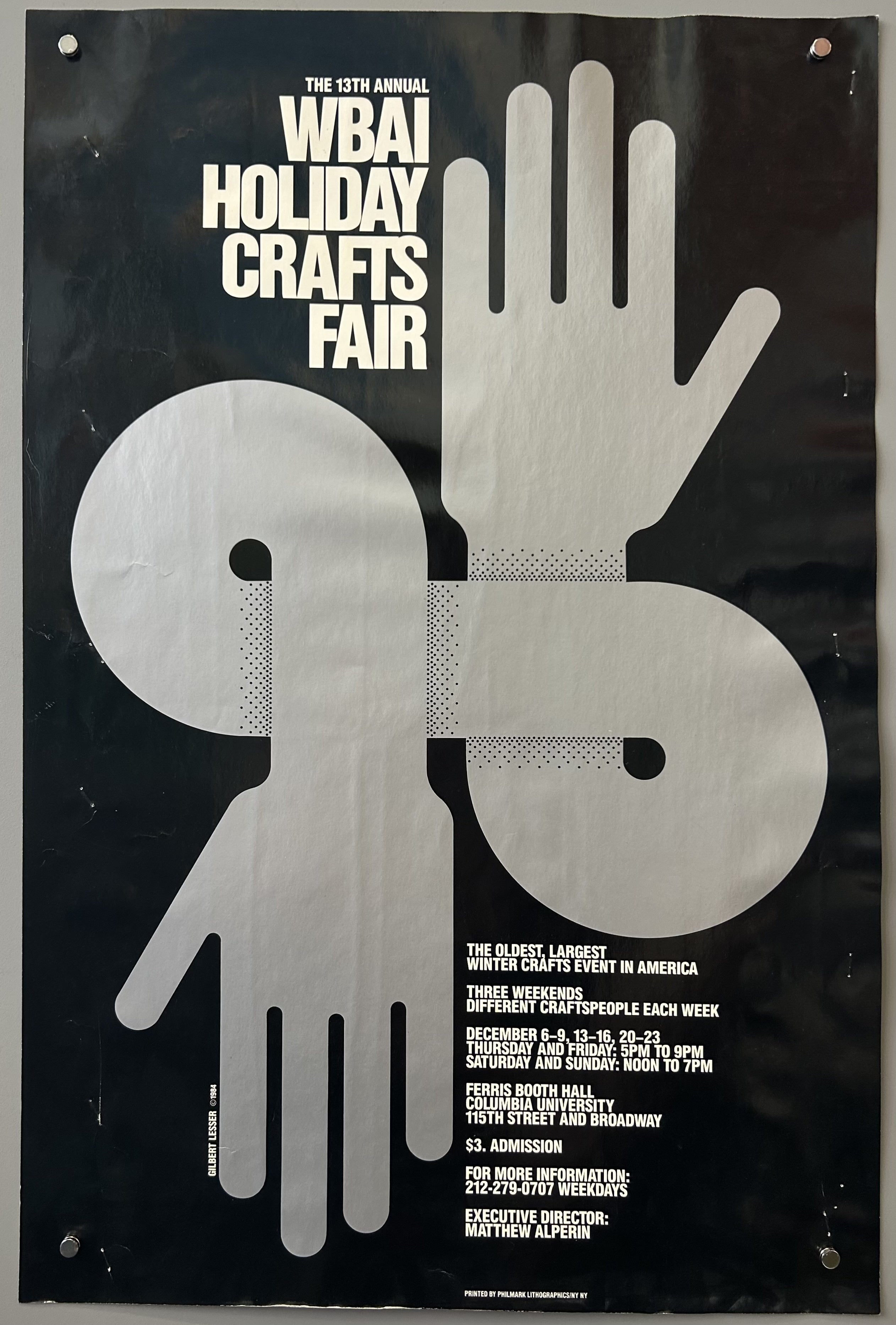 Graphic poster: 13th Annual WBAI Holiday Crafts Fair. Design features stylized, abstract arrangement of two pairs of hands, with two circular shapes containing a halftone dot pattern.
