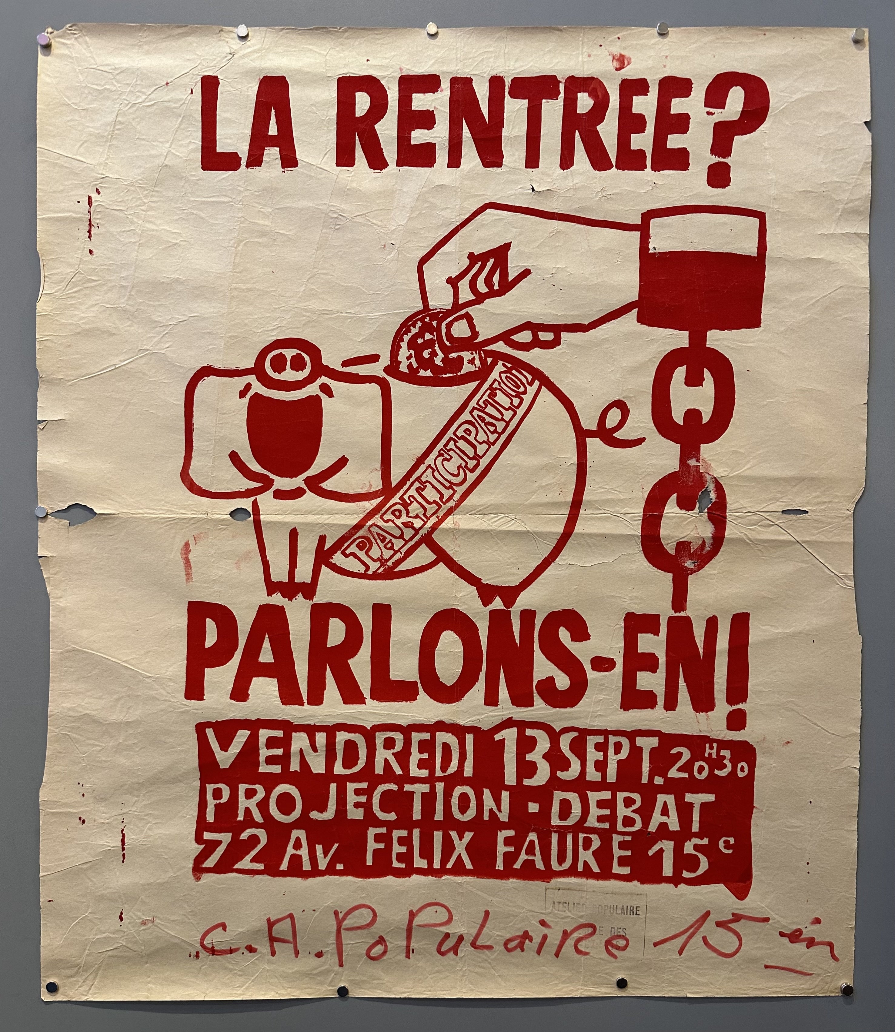 A hand inserts a coin into a piggy bank with red text above and below encouraging demonstrations during May 68.
