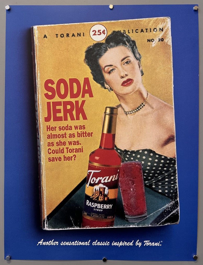 A vintage-style book cover titled "SODA JERK" with "A TORANI PUBLICATION NO 20" and "25¢" at the top. The cover features an illustration of a woman in a polka-dot dress looking over her shoulder, next to a bottle of Torani Raspberry Syrup and a glass of red liquid.