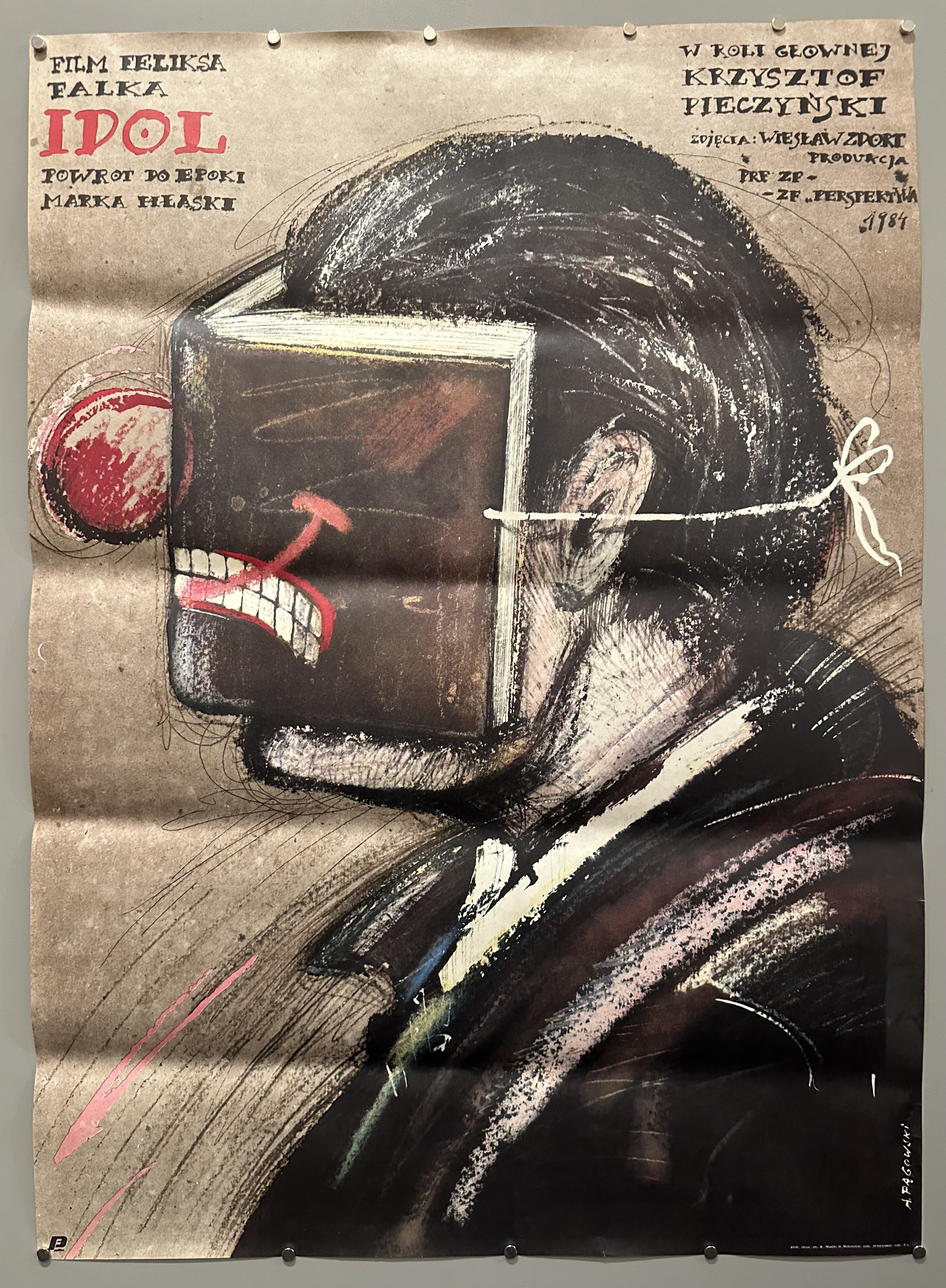 Charcoal/oil style drawing of a profile of a man with a clown nose on for Polish film.