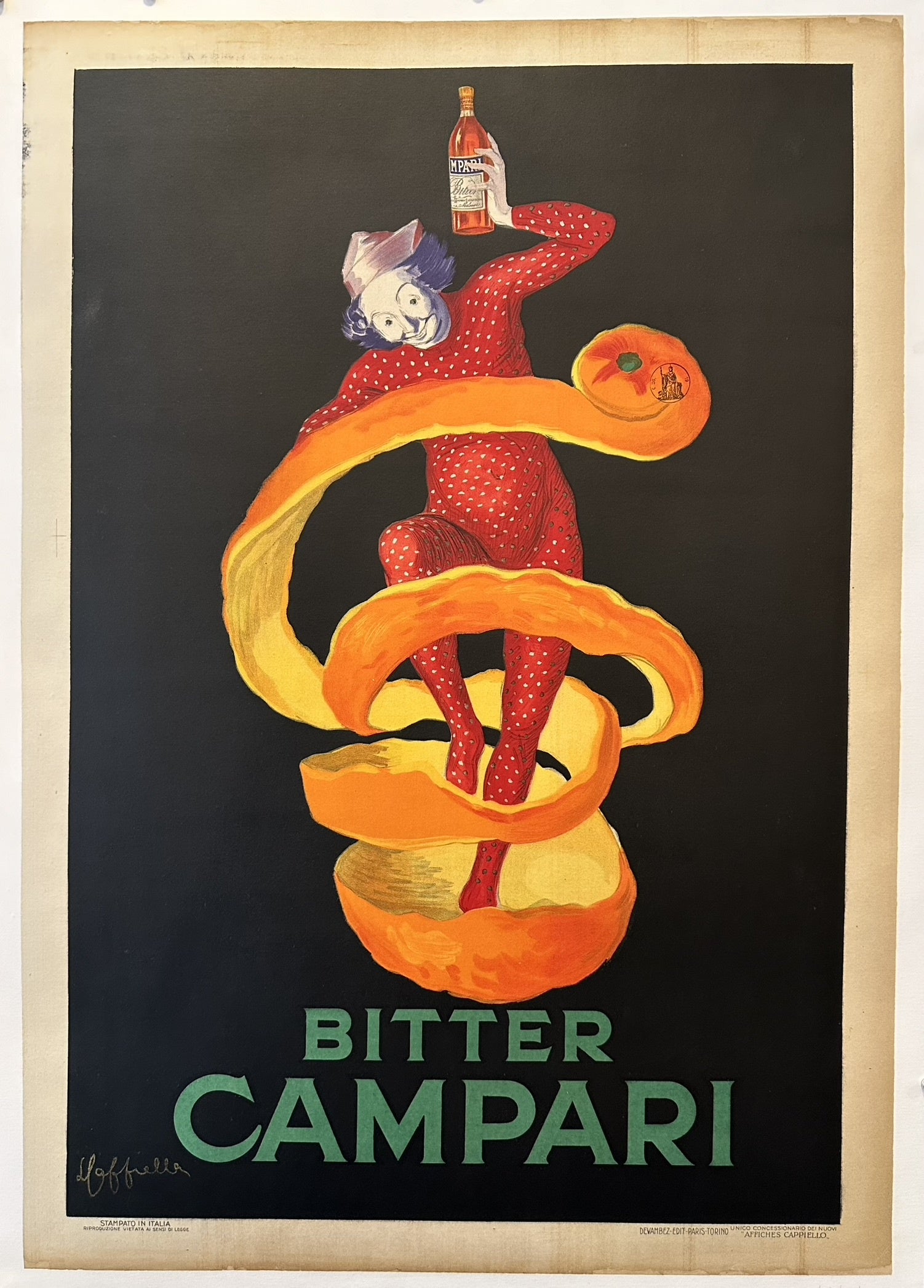 a bright dynamic figure floating on a black background. The clown cleverly emerges from the orange as it is peeled, with Campari in hand.