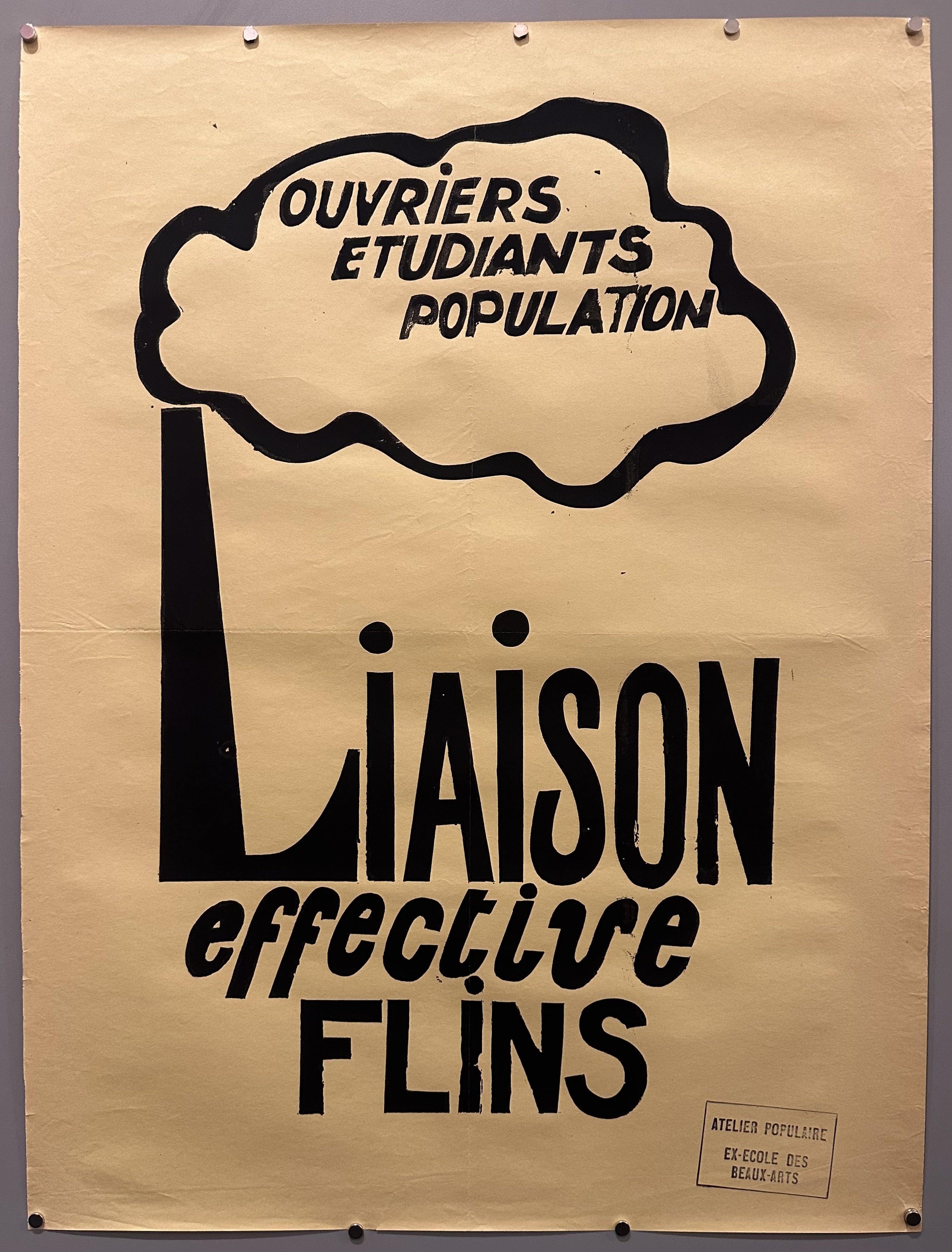 The 'L' in 'Liaison' represents an industrial chimney that spouts a cloud with the rest of the text inside of it in this May 68 propaganda poster.