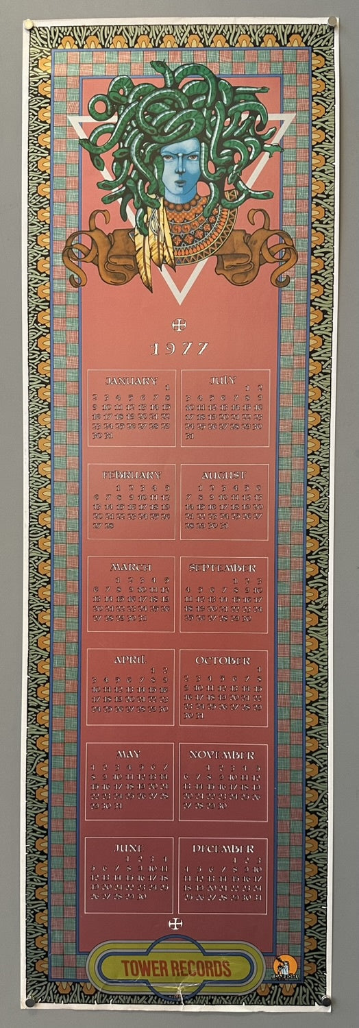 1977 Tower Records calendar poster featuring a stylized illustration of Medusa with green snakes for hair and a blue face, set against a red background with a decorative border, and showing a monthly calendar layout below.