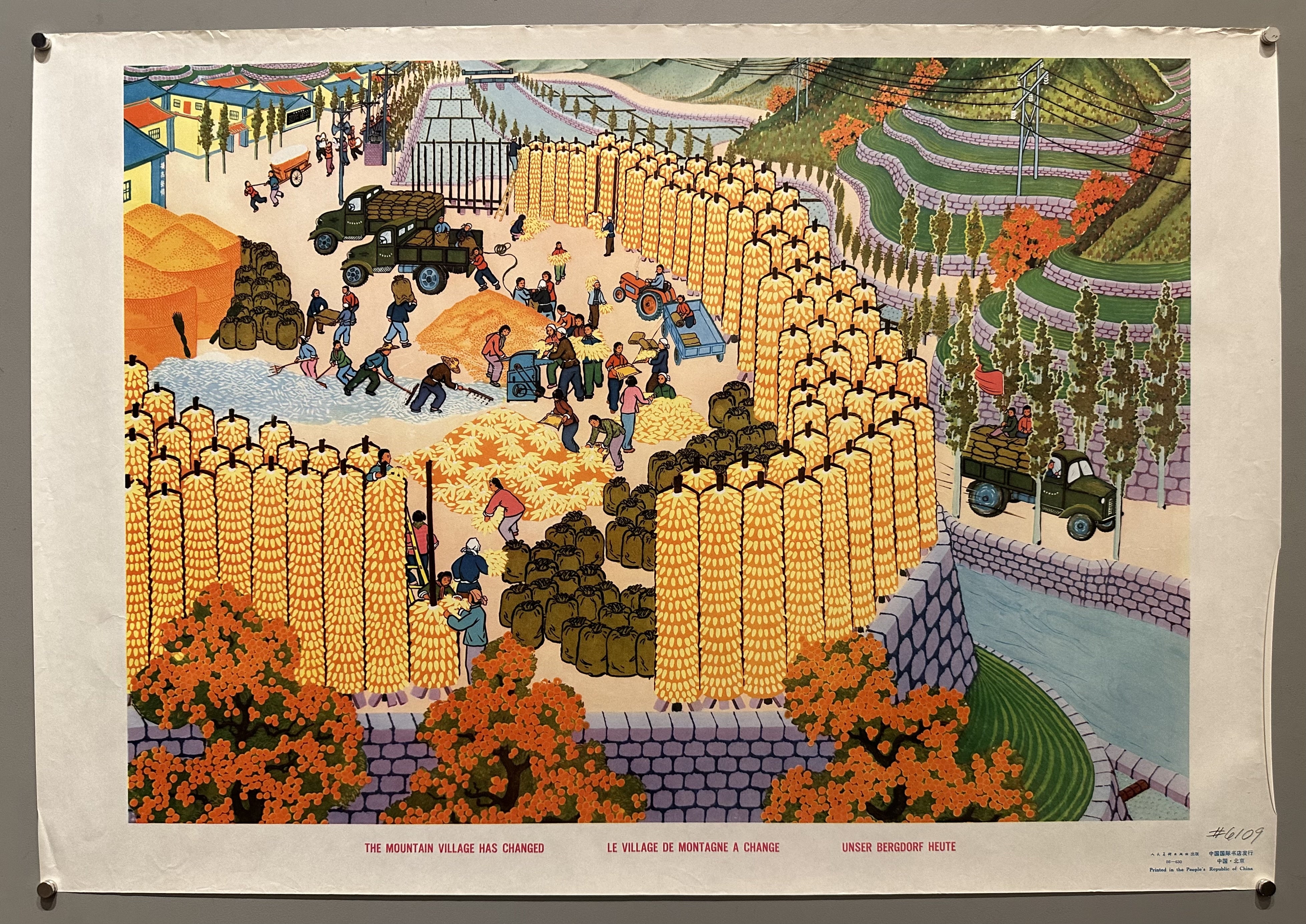 Villagers harvest and create barriers in this detailed landscape of life in the PRC under Mao's rule.