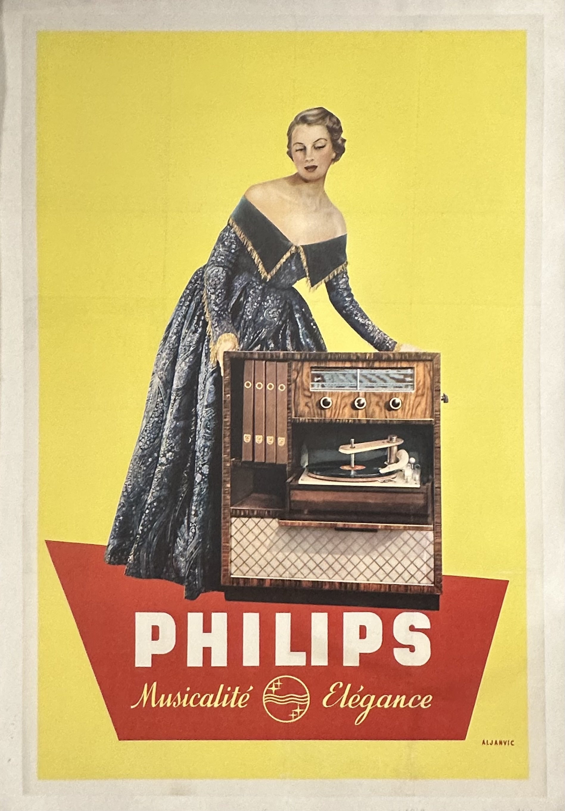 Yellow poster with woman holding radio over red square with white and yellow text inside to promote Philips Radio.