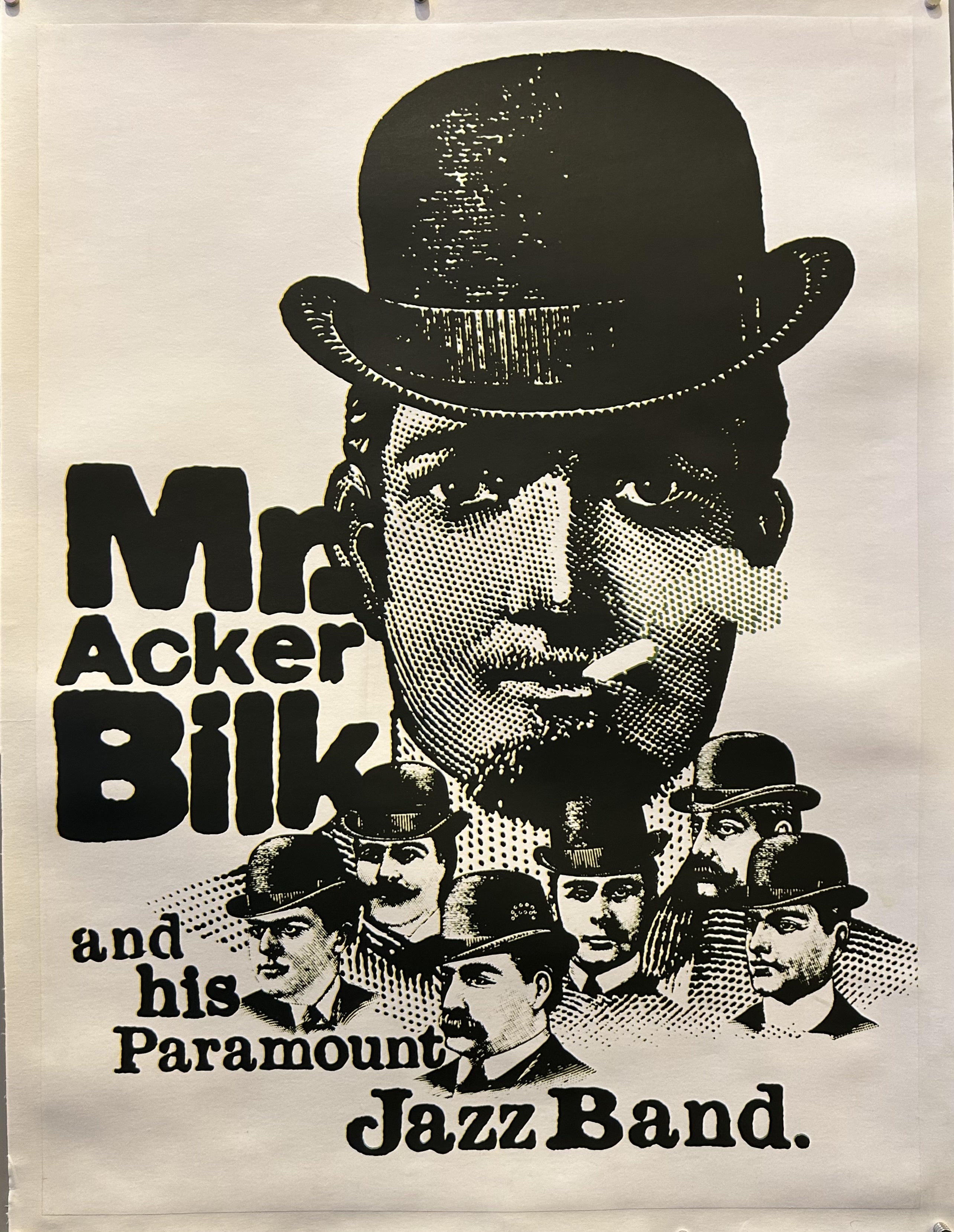 Black and white poster advertising Acker Bilk's JazzBand. There are 7 men wearing suits with the 7th above them all smoking.