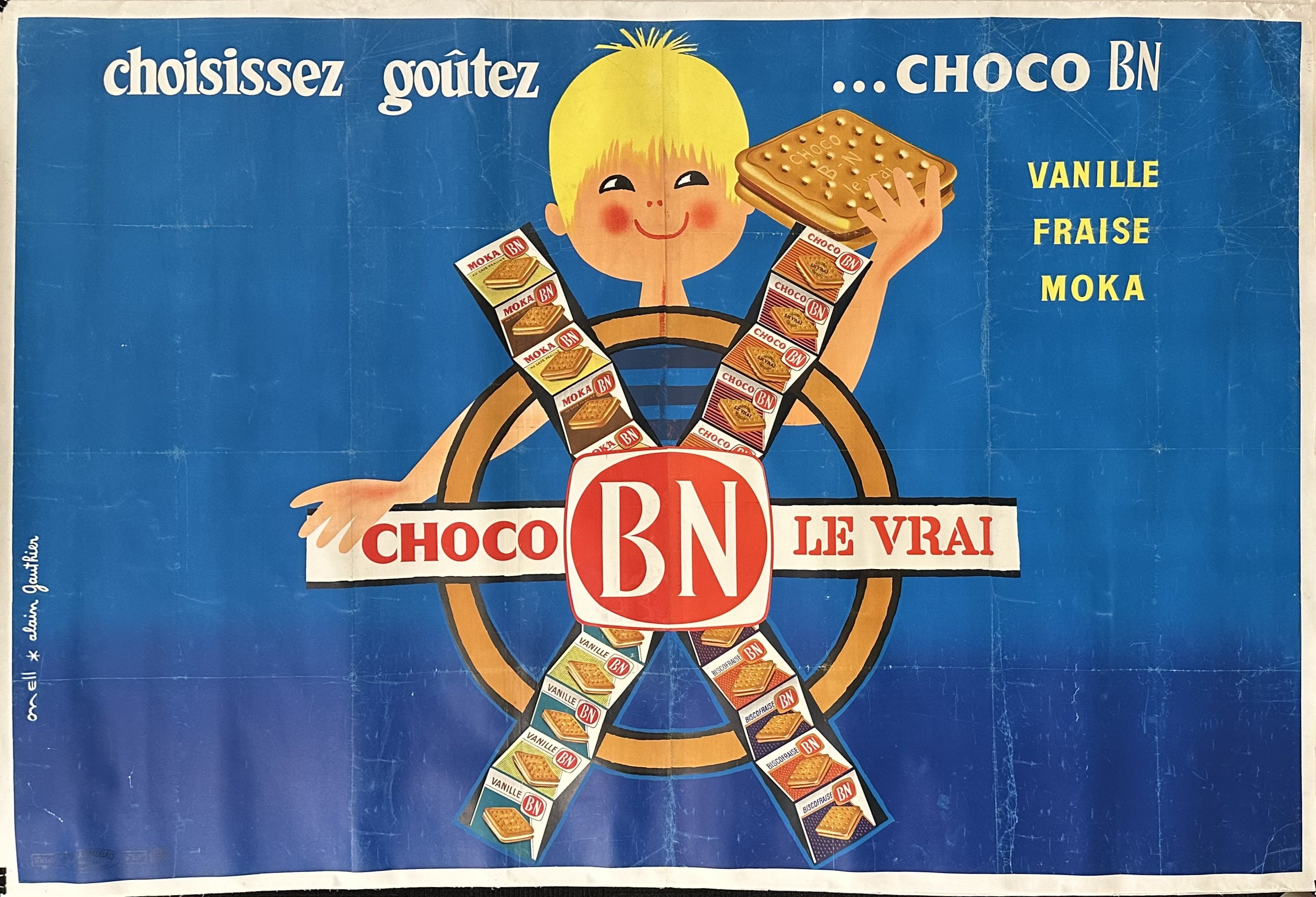 A boy holds up choco BN biscuits in this French advertisement.