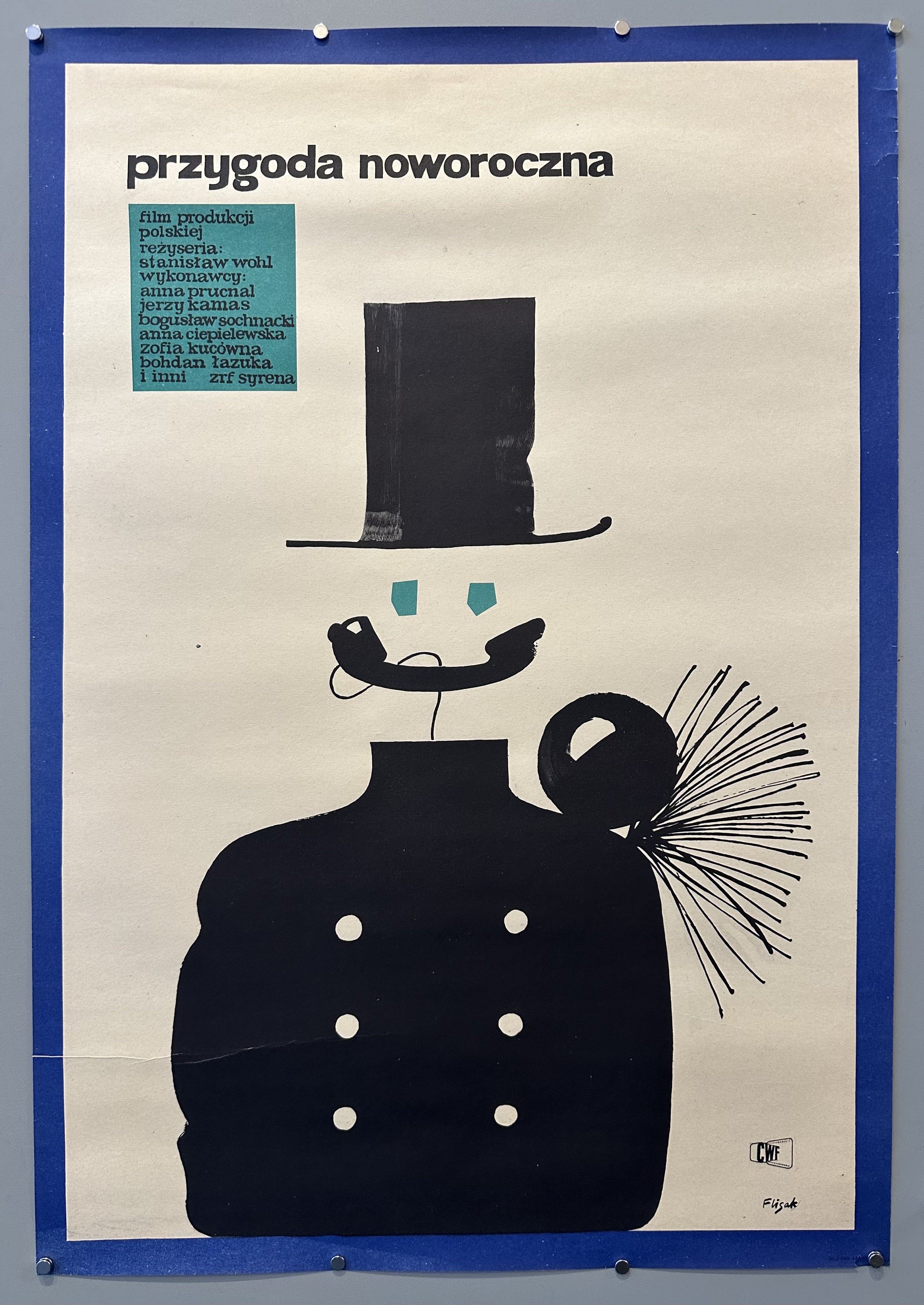 Polish film poster features illustrated man in top hat with a telephone for a smile against a white background, blue border and light blue accent colors.