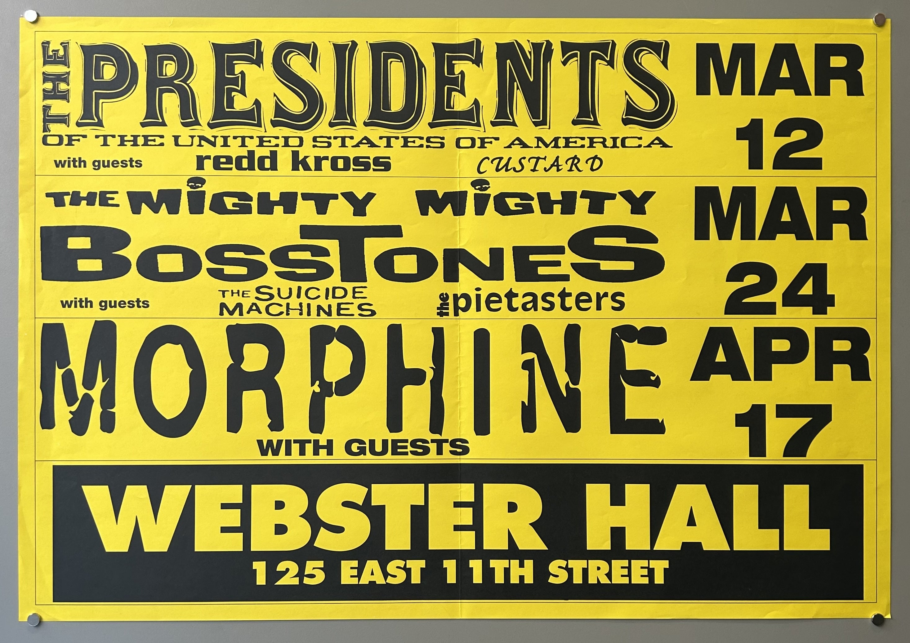 Yellow poster with black text promoting various musical acts at Webster Hall in March-April 1997.
