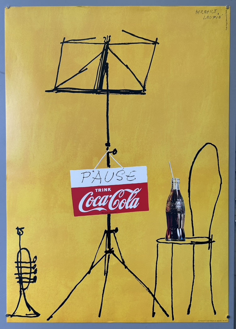 It literally interprets the Coca-Cola slogan "Take a break" or "The pause that refreshes," depicting a musical setting where a musician is taking a break to enjoy a Coca-Cola.