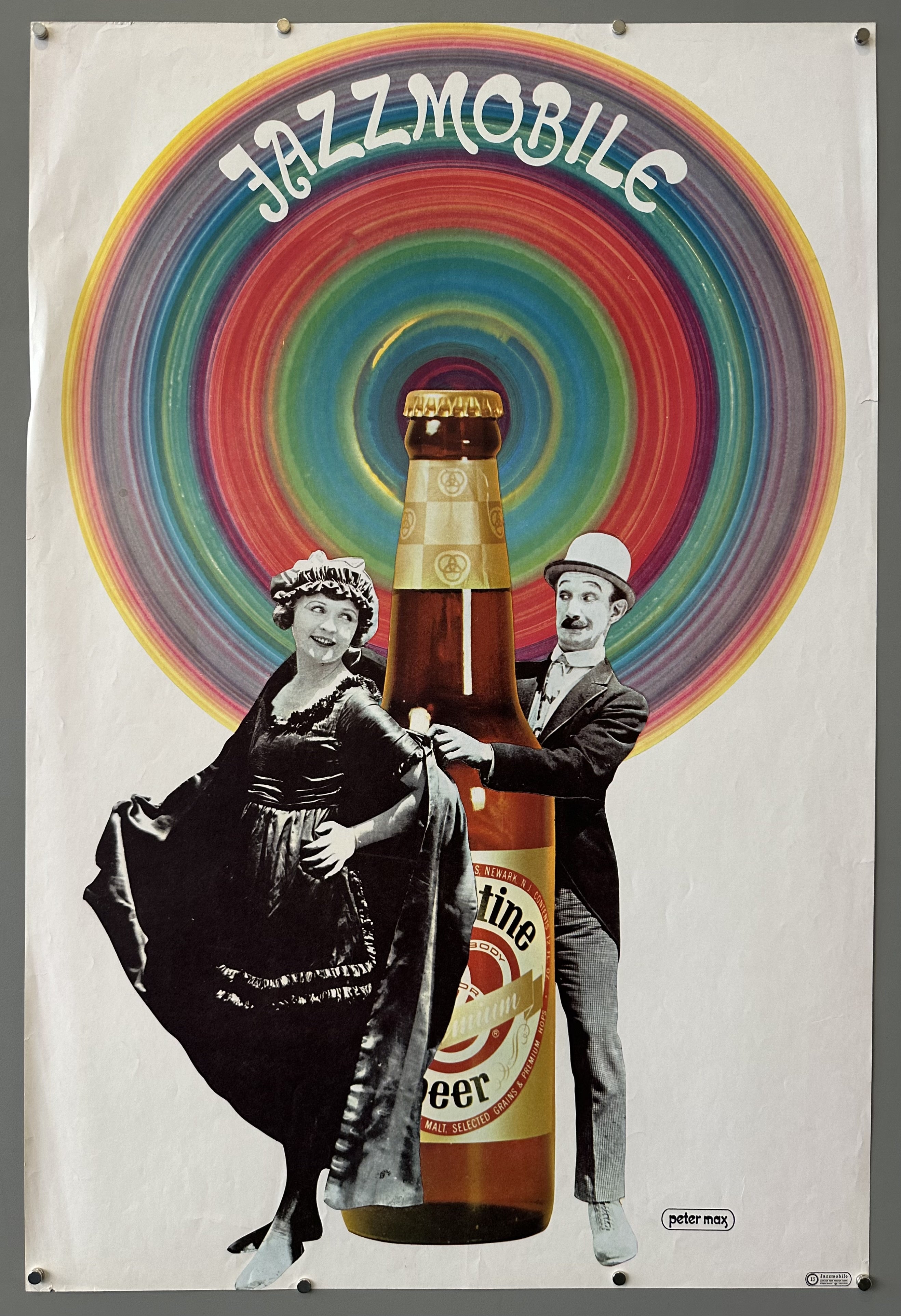 Peter Max designed ad for Ballantine Beer 'Jazzmobile' with color ring behind two figures holding a cut out of the beer.