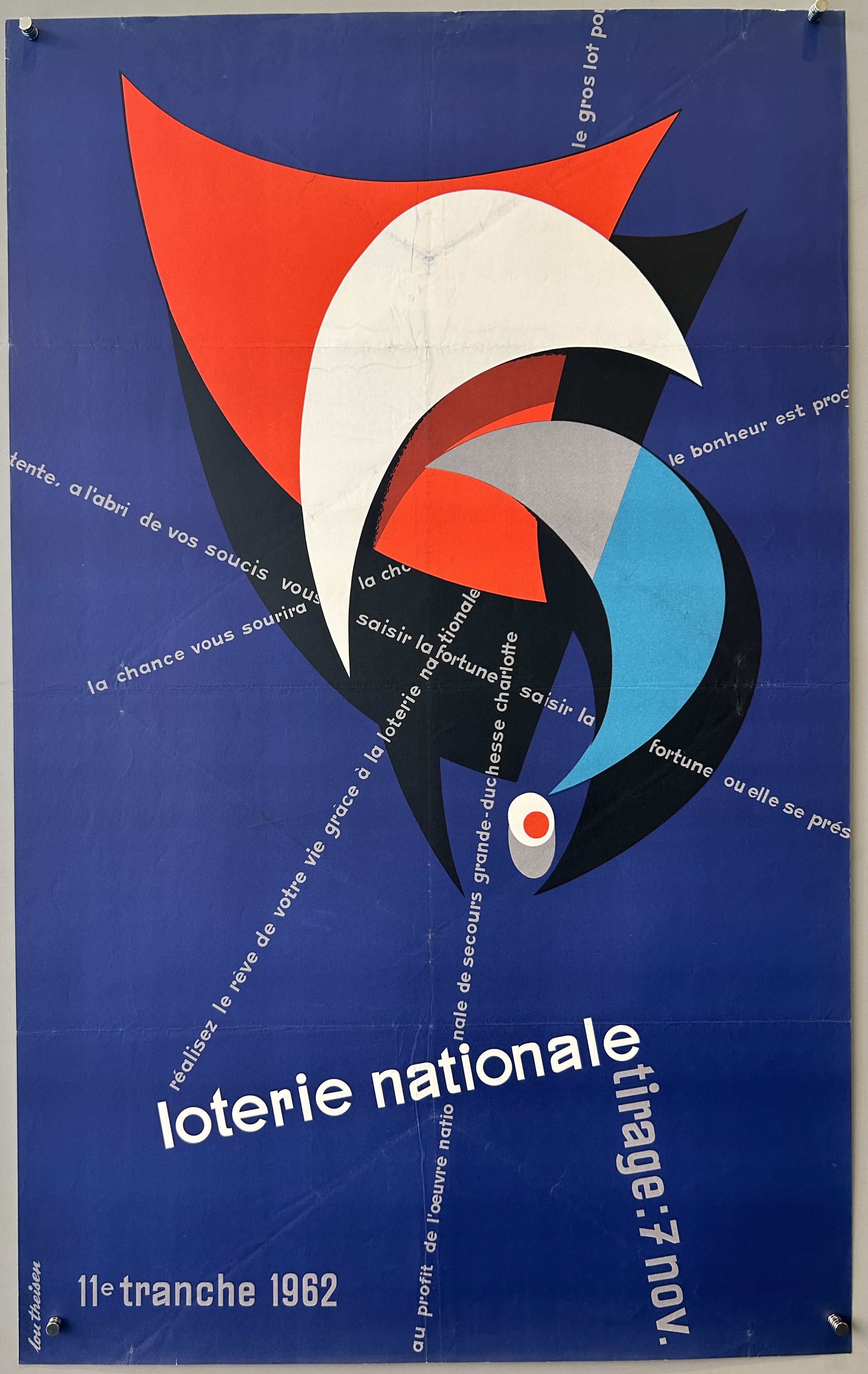 Blue background with a abstract circle promoting the Luxembourgish National Lottery, benefiting the National Relief Work of Grand Duchess Charlotte